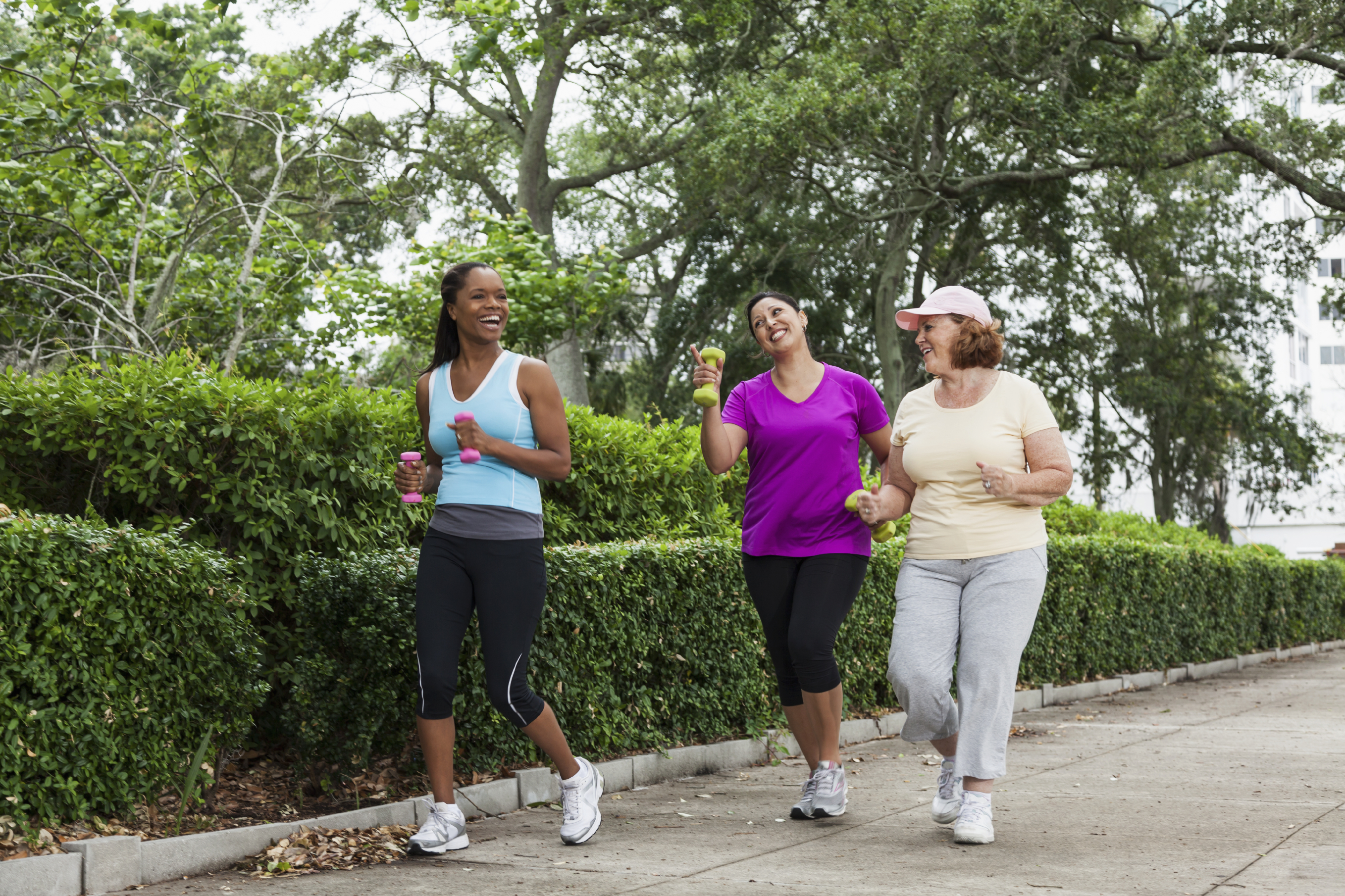 Women exercising in park