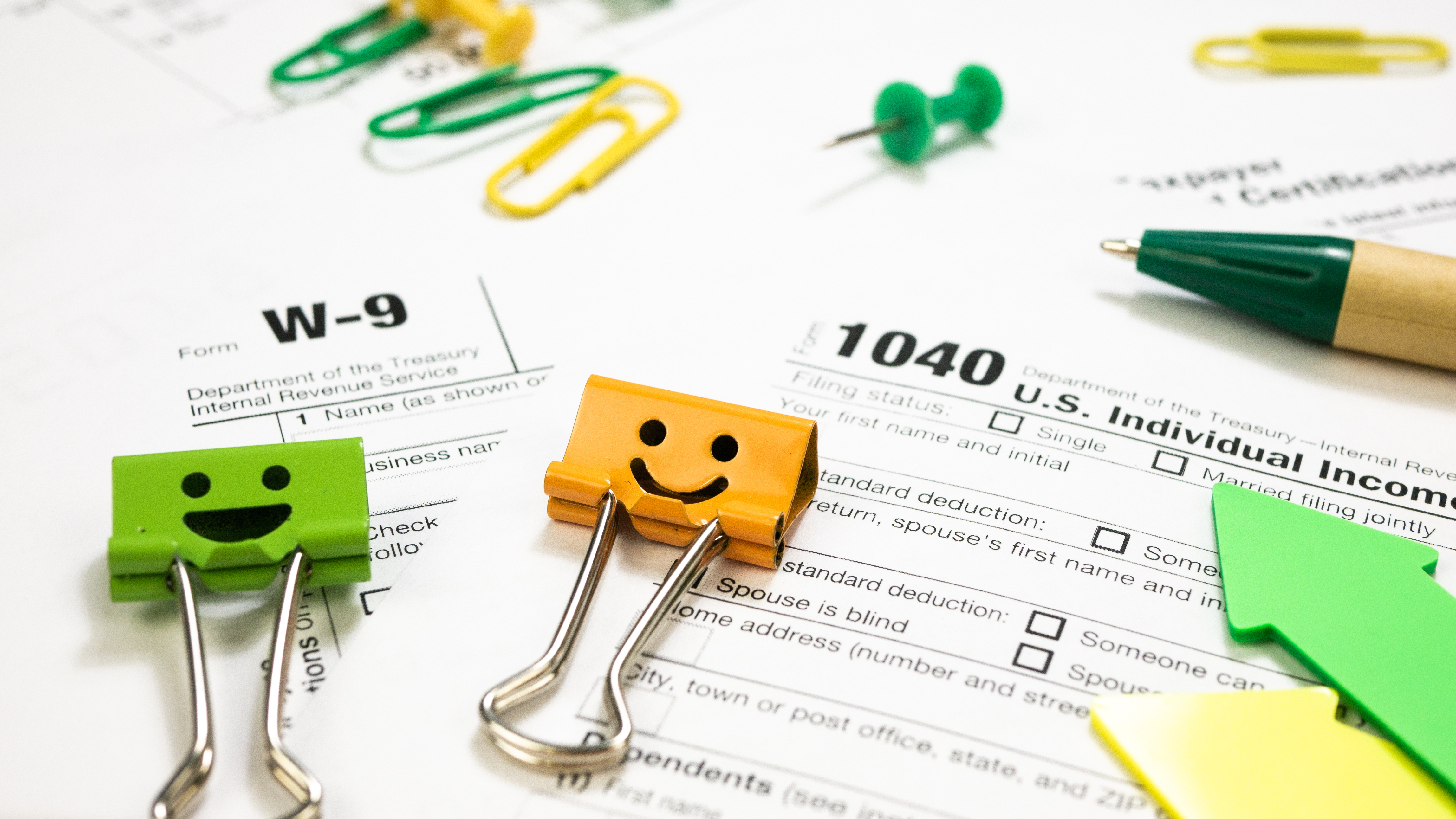 Smile Binder Clips with 1040 Tax Form and W-9