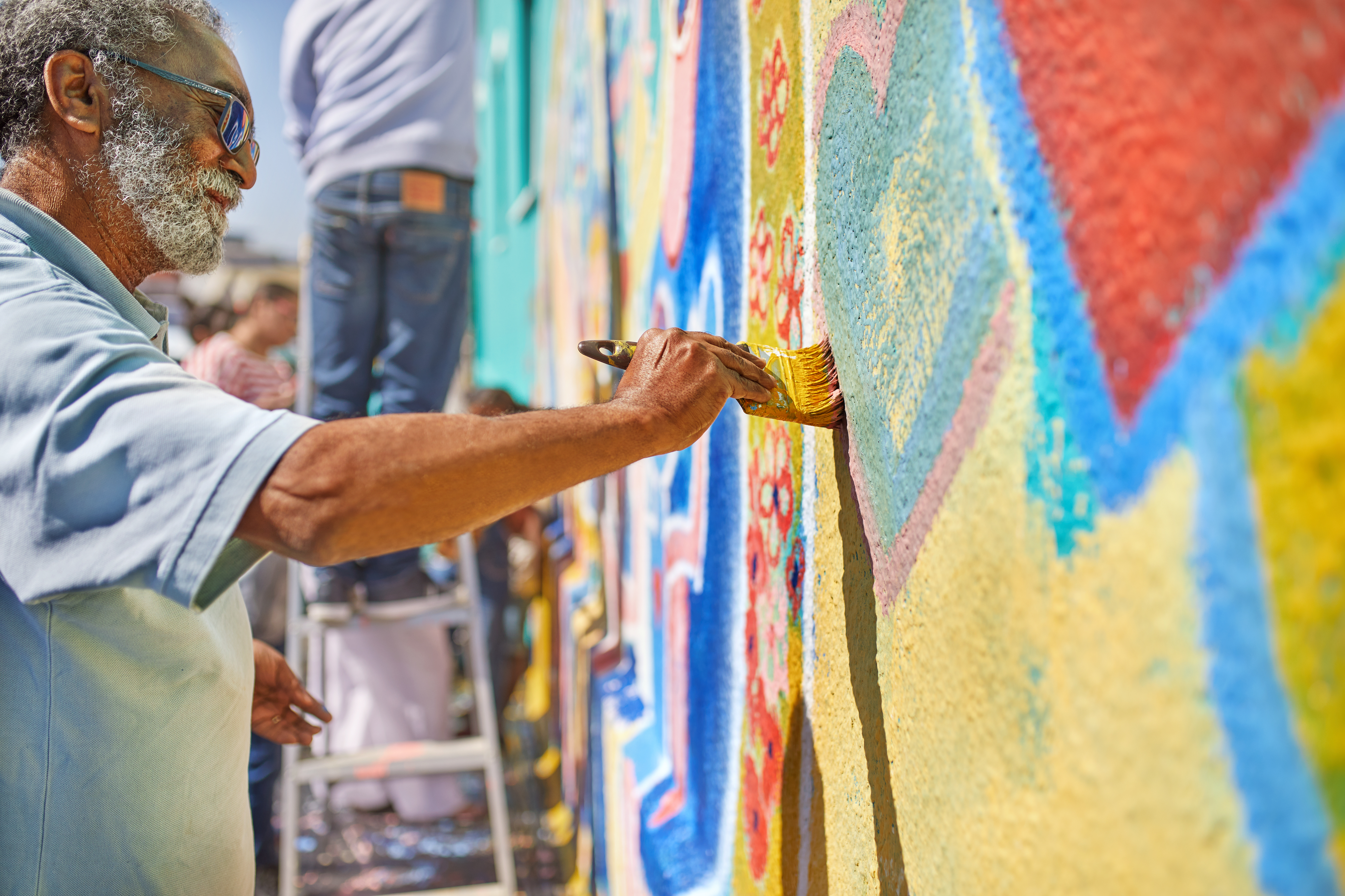 Volunteer Painting Mural