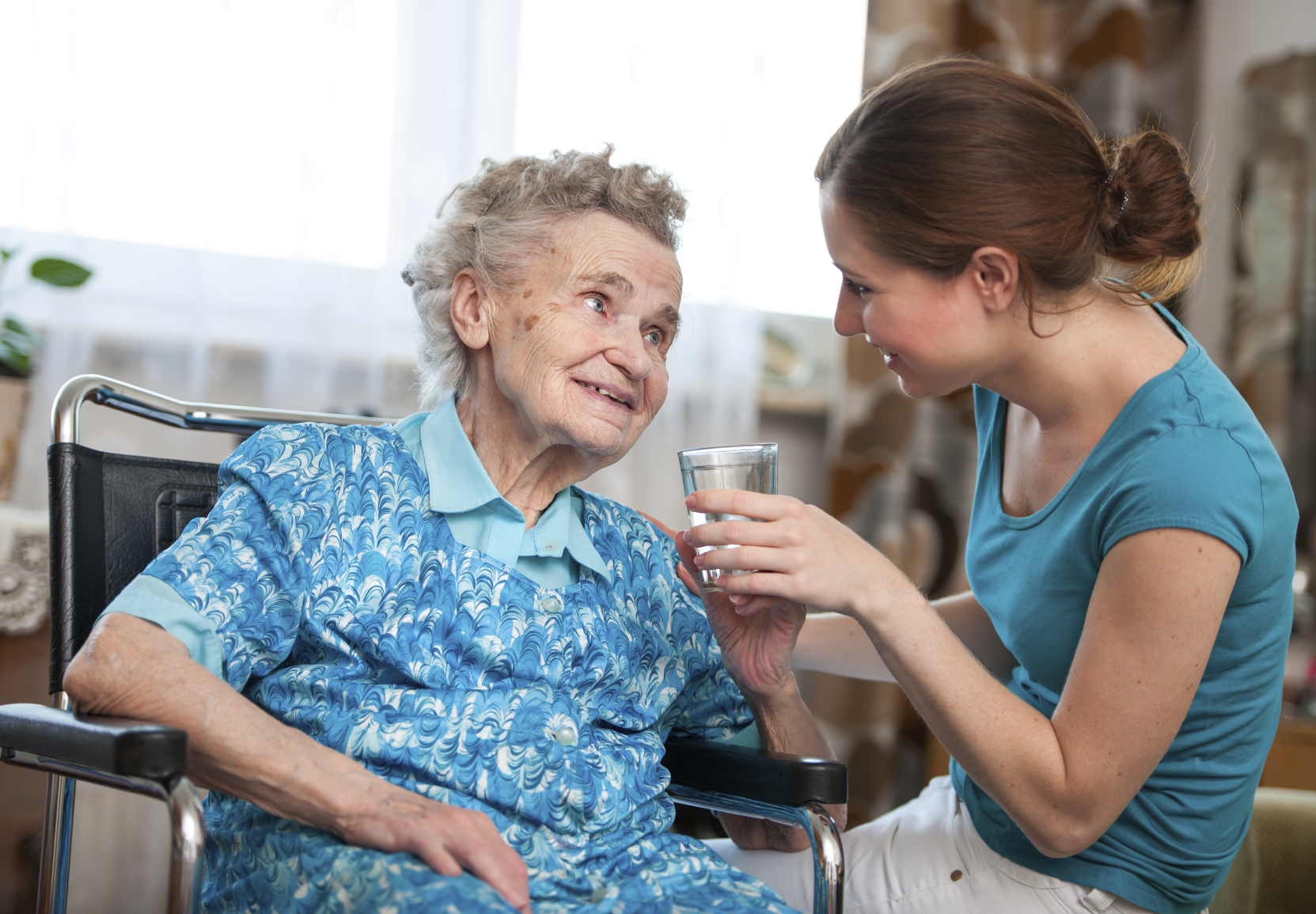 senior woman with home caregiver