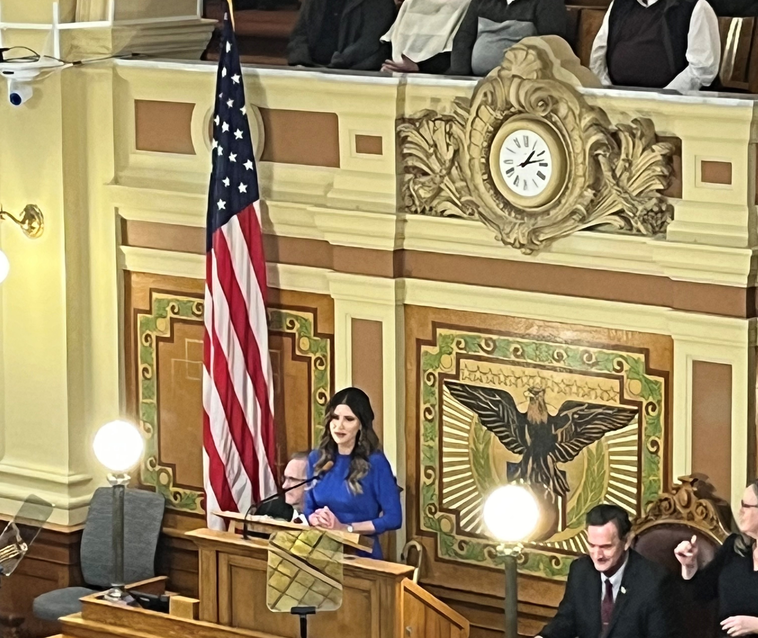 Governor Kristi Noem stands at the podium to deliver her 2023 State of the State Address.