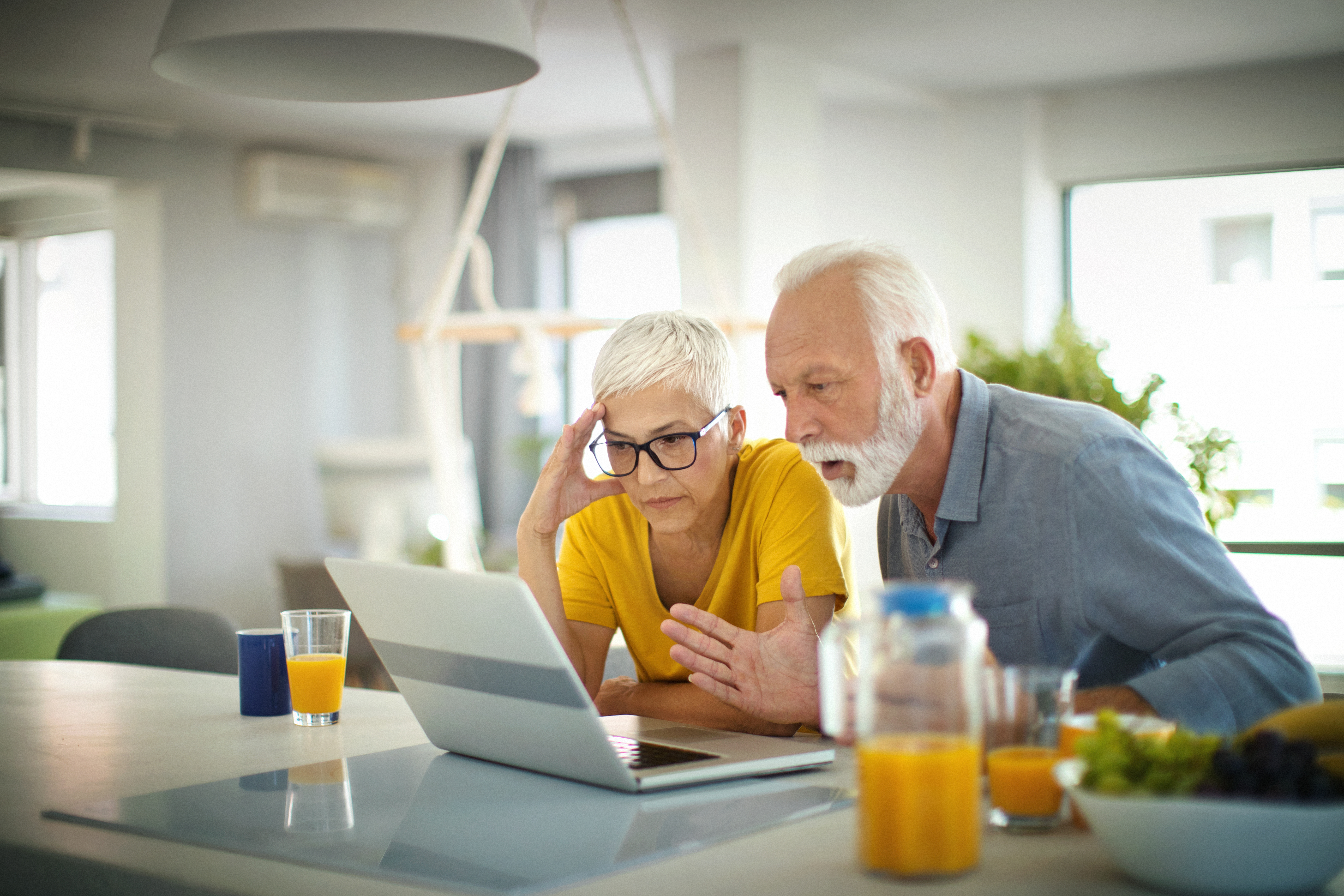 Senior couple isolated at home.