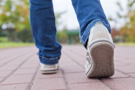 +-sneakered-feet-on-sidewalk-Blog-april-14-13409511_s