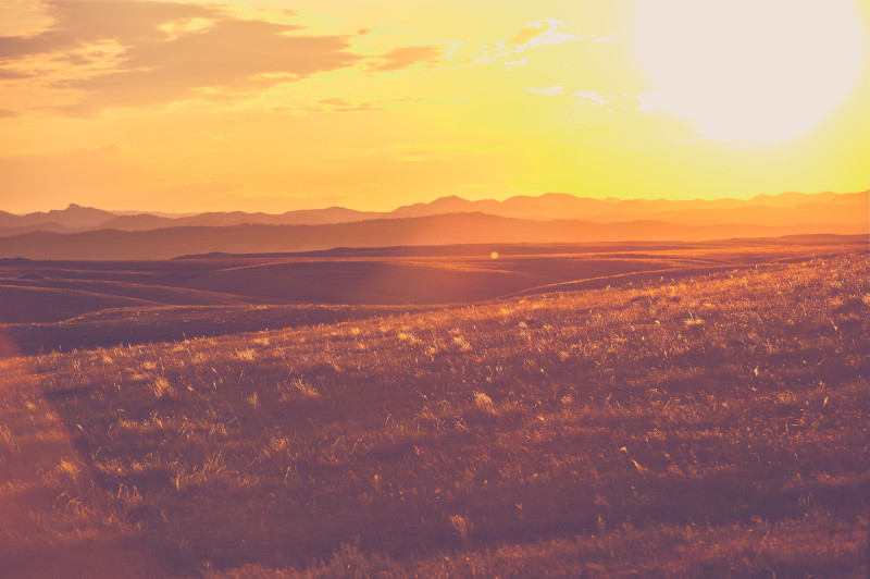 Aerial View Of Landscape Against Sky During Sunset