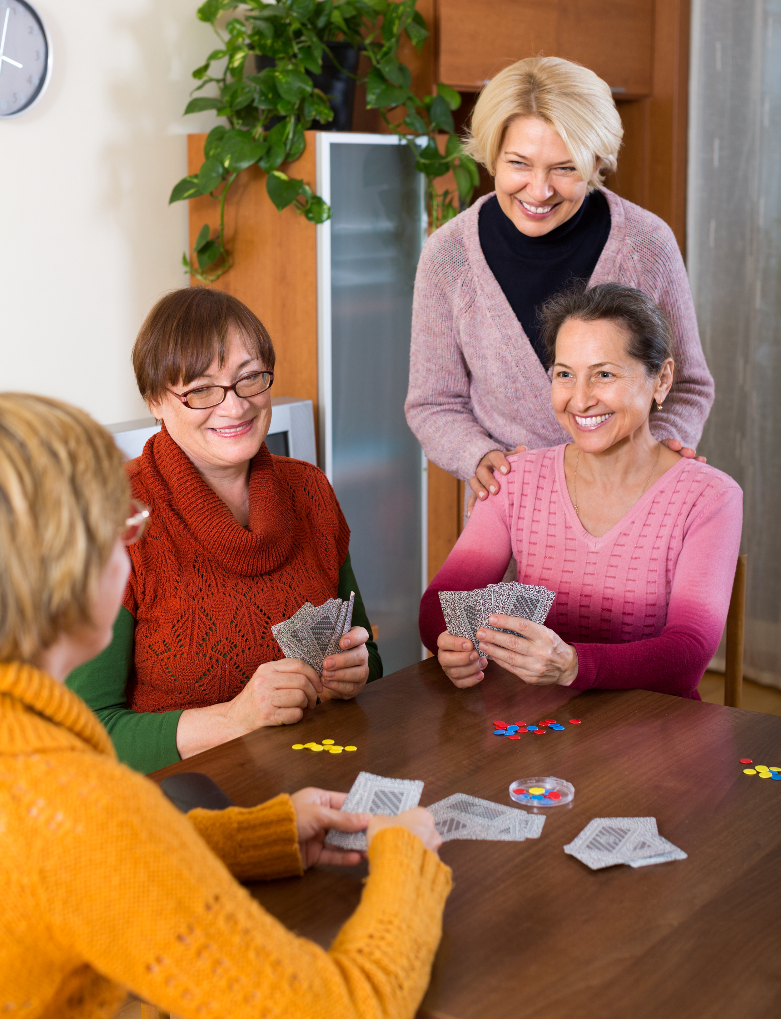 Female pensioners playing cards