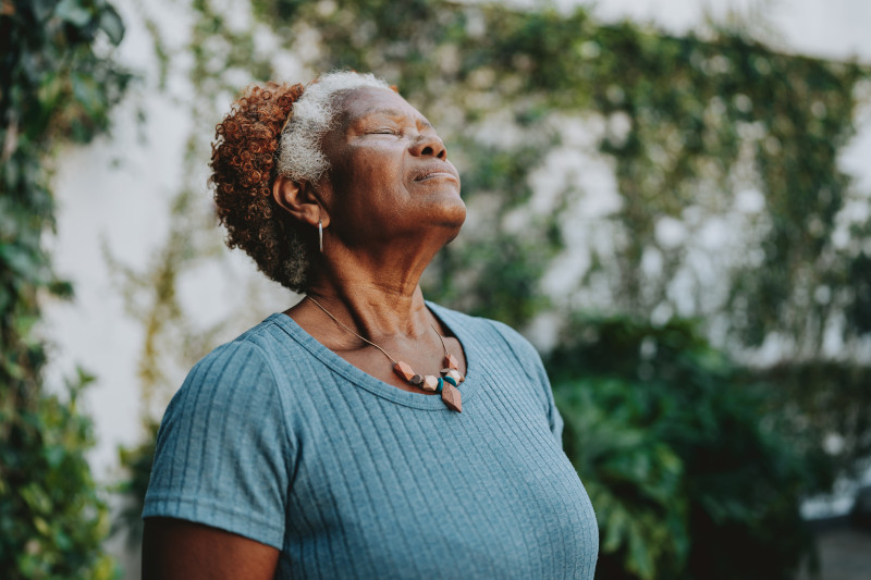 Portrait senior woman breathing