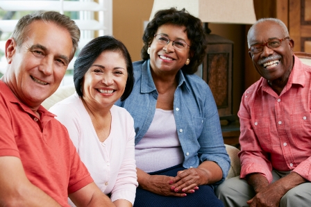 Portrait Of Senior Friends At Home Together