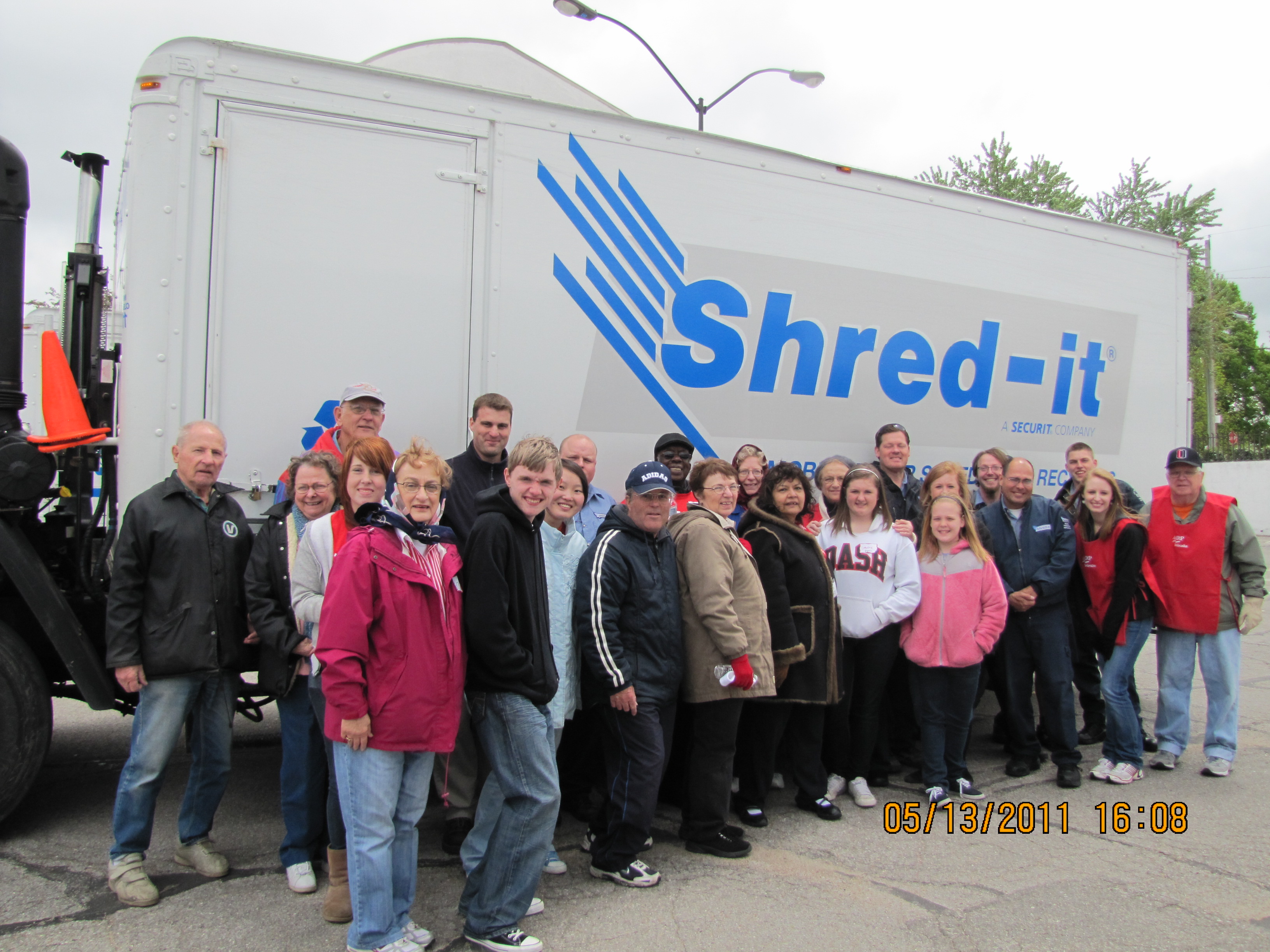 AARP Volunteer team and Shred-It staff