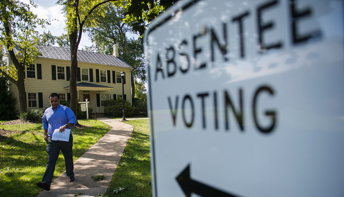 A man walks out of an absentee voting station