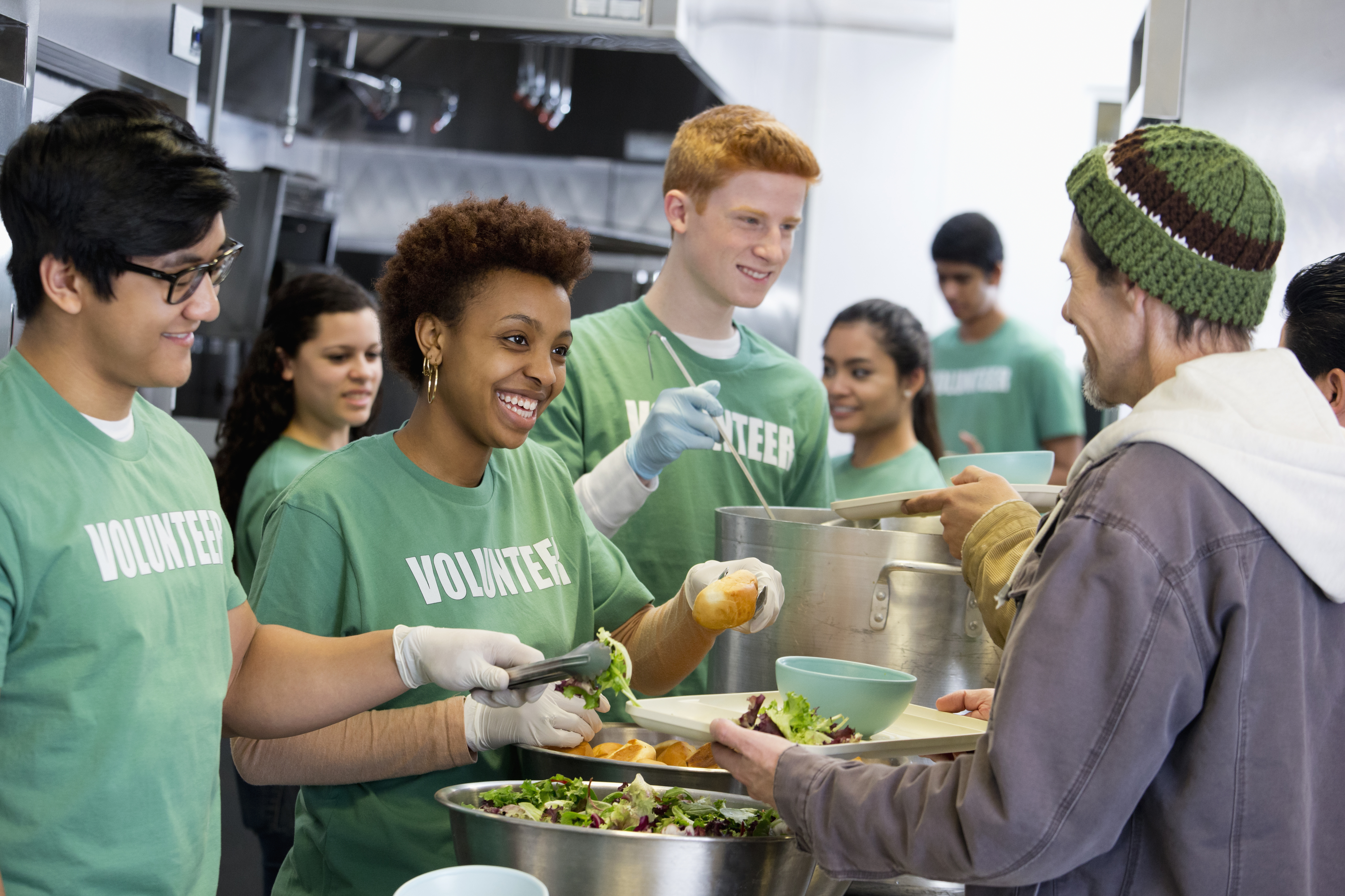 Volunteers working in soup kitchen