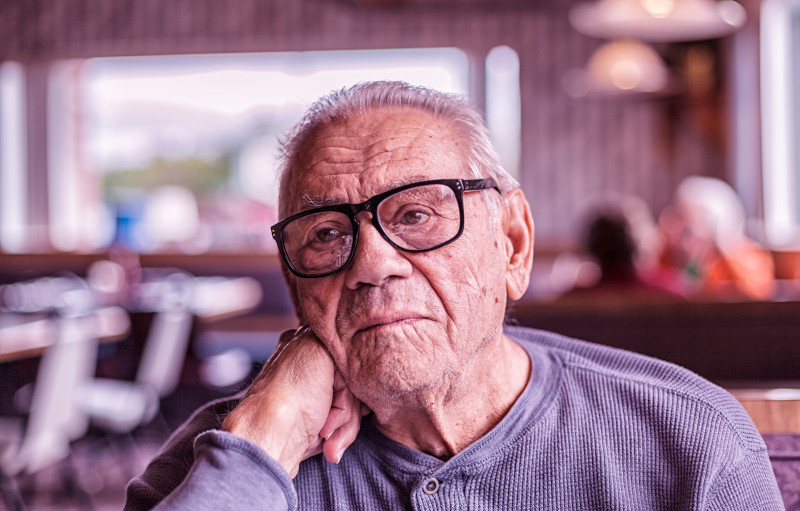 Elderly Dementia Man Day Dreaming Waiting For Breakfast