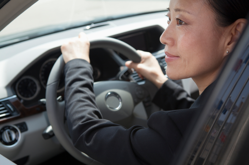 iStock_asian woman driving XiXinXing