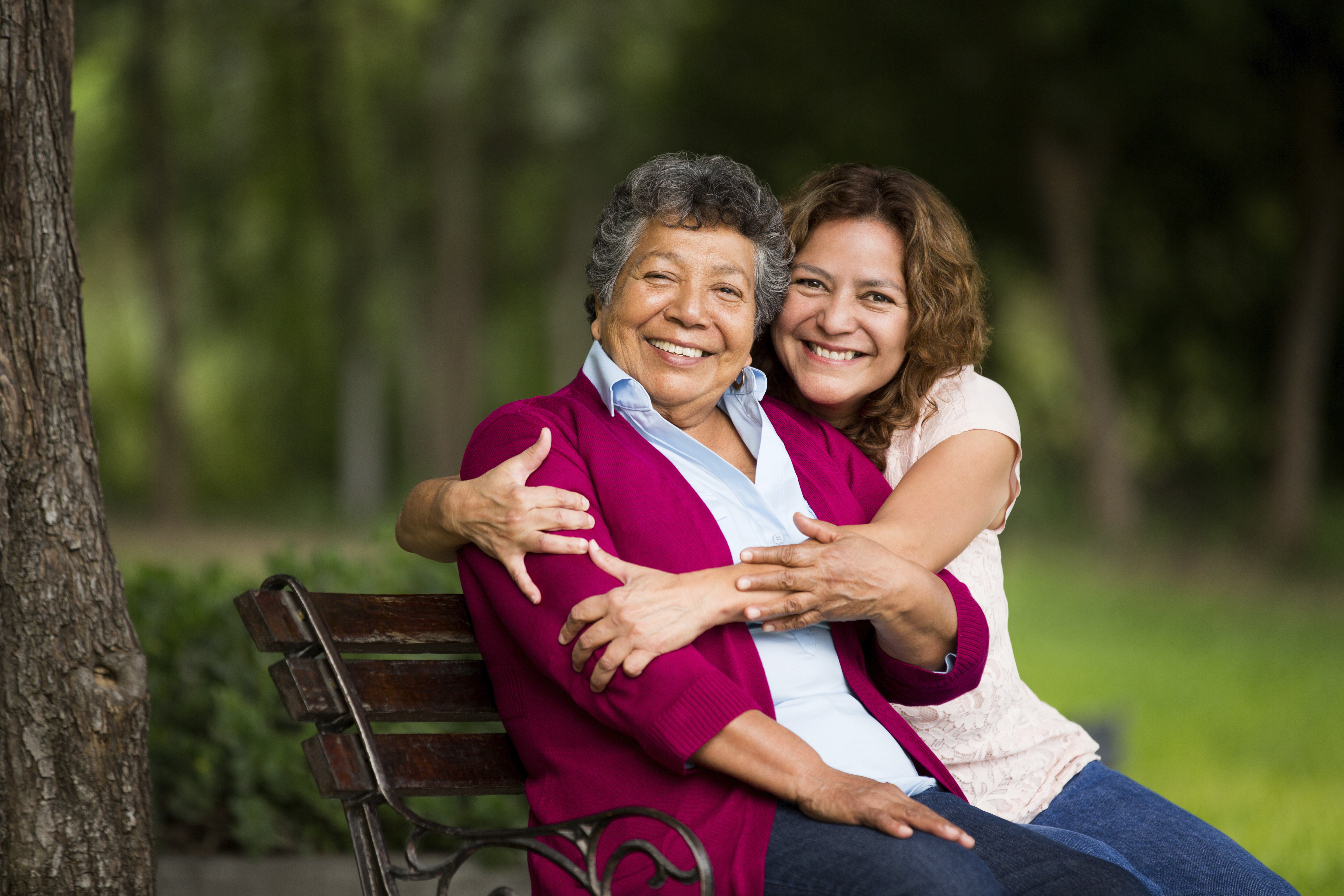 Mother and daughter on bench