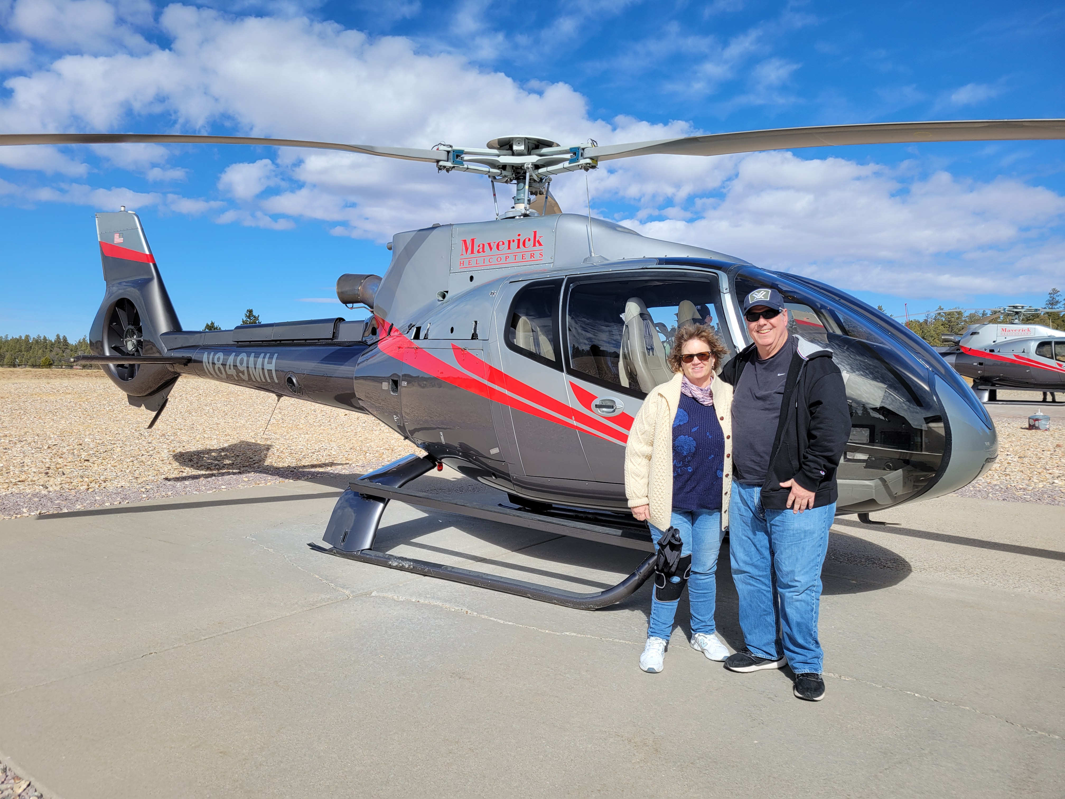 Jeff and Leslie Helicopter Pic.jpg