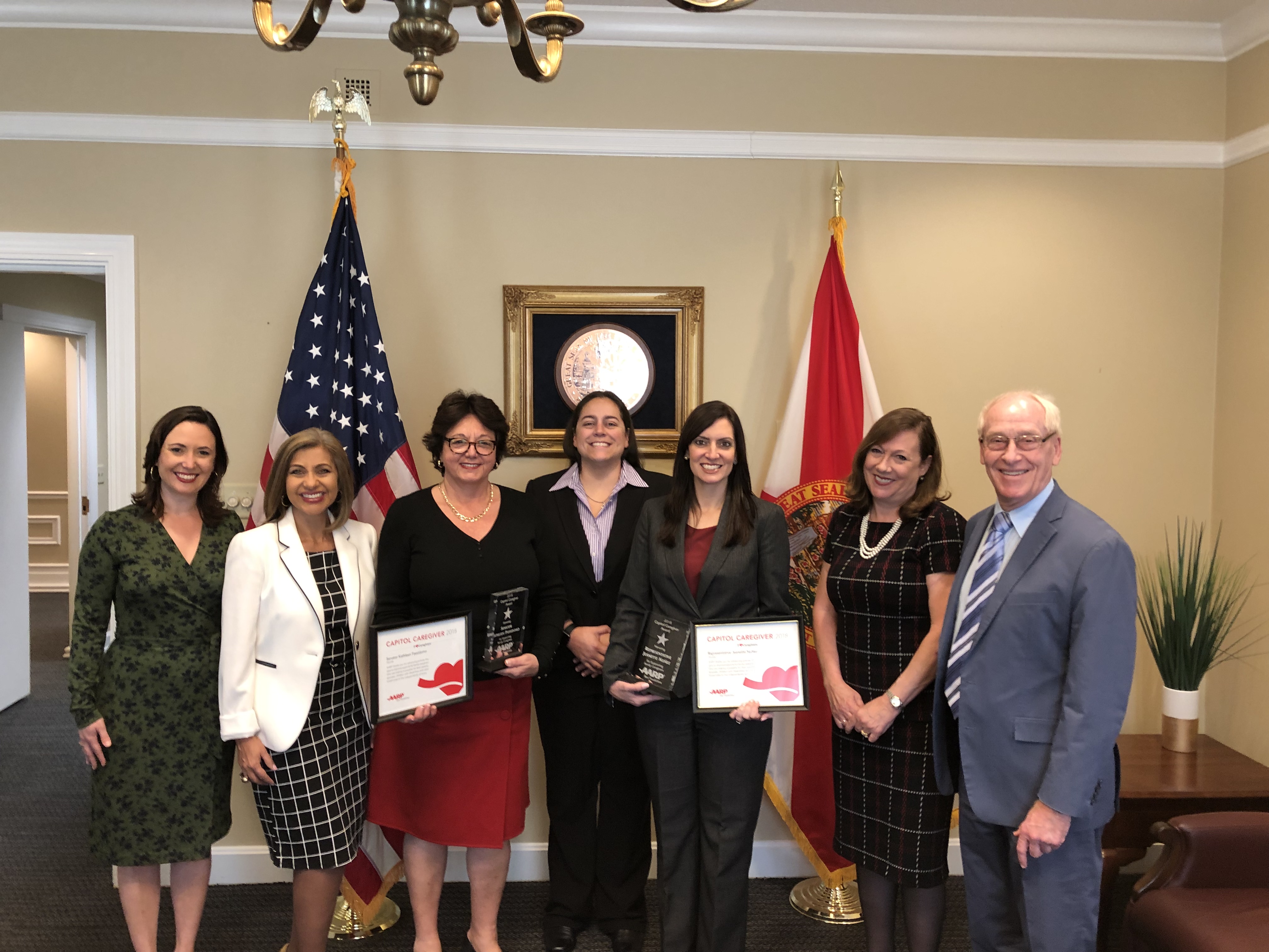 AARP staff members presenting certificate to Senator Passidomo and Lt. Gov Nunez