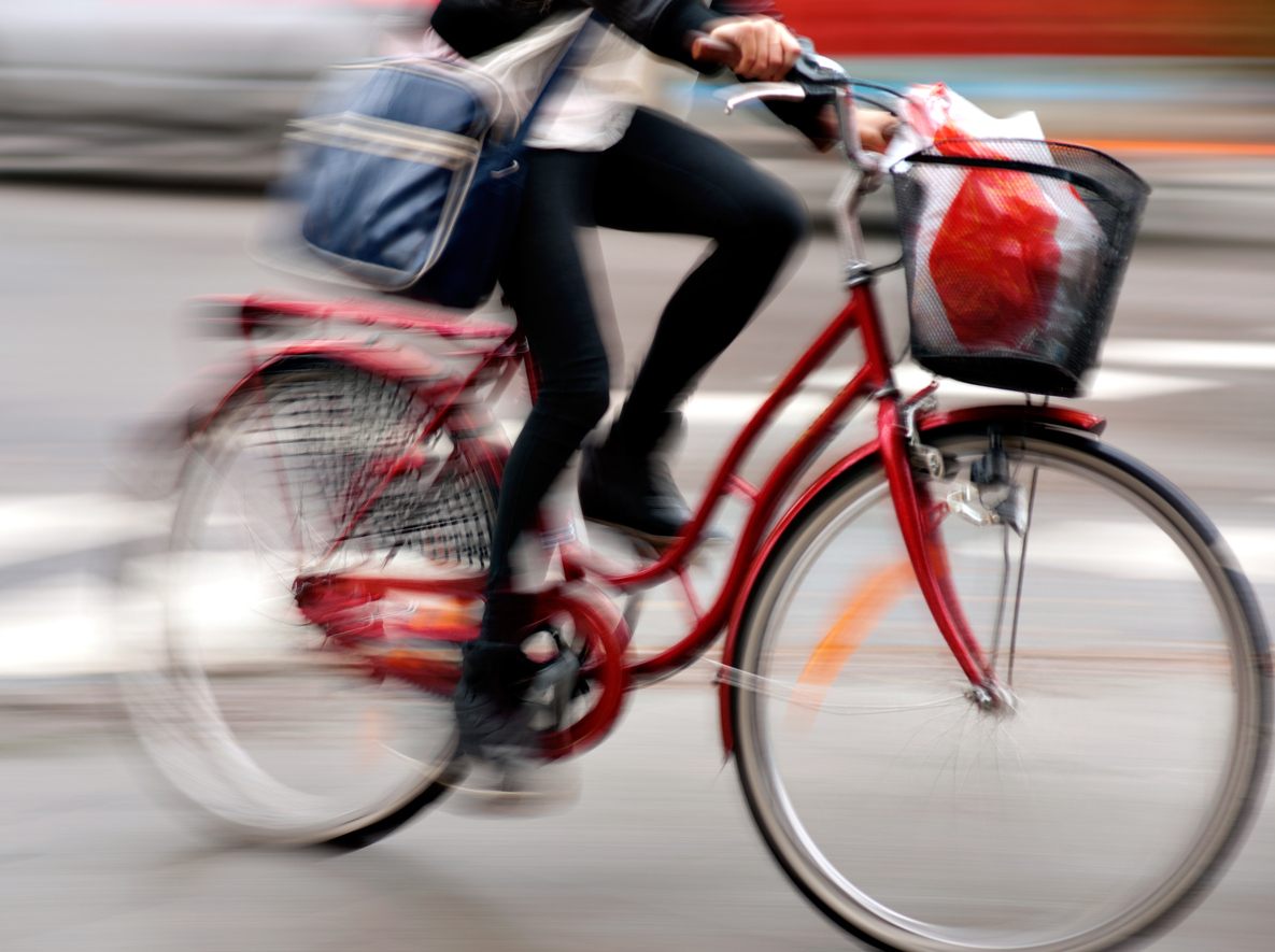 young woman on bike