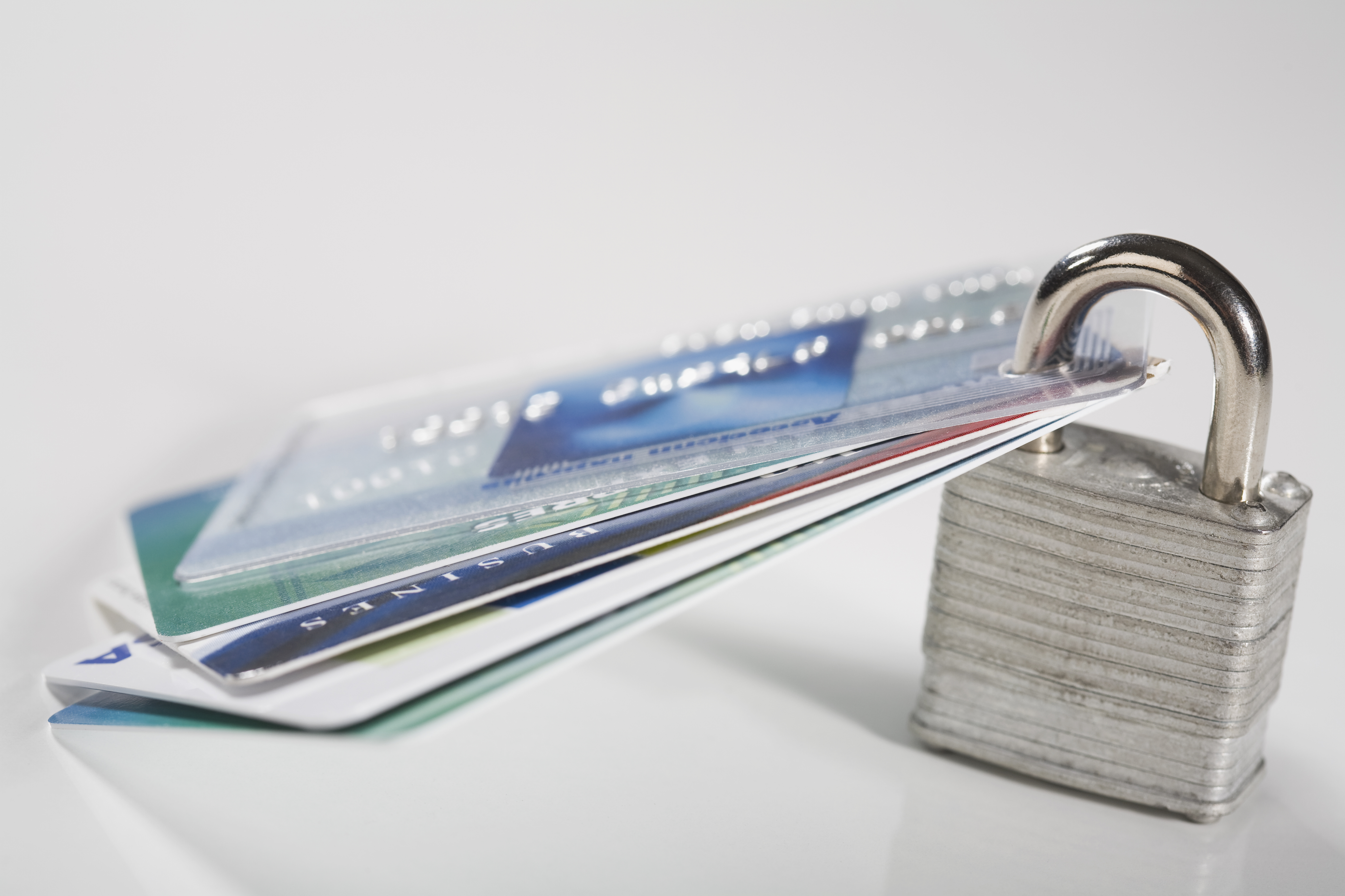 Close-up of credit cards with a padlock