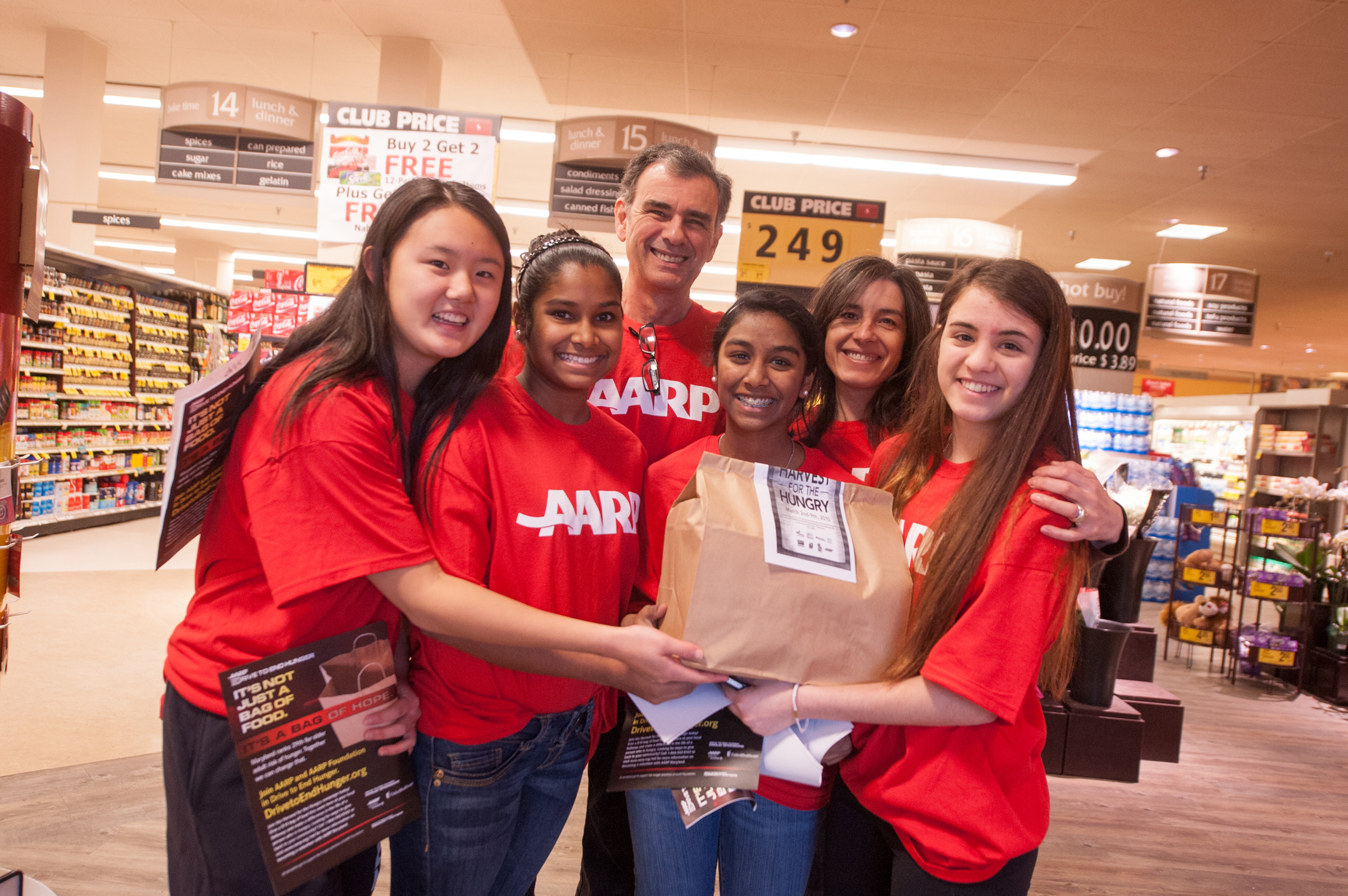 Aldo and some young AARP volunteers encouraged Safeway customers to donate.