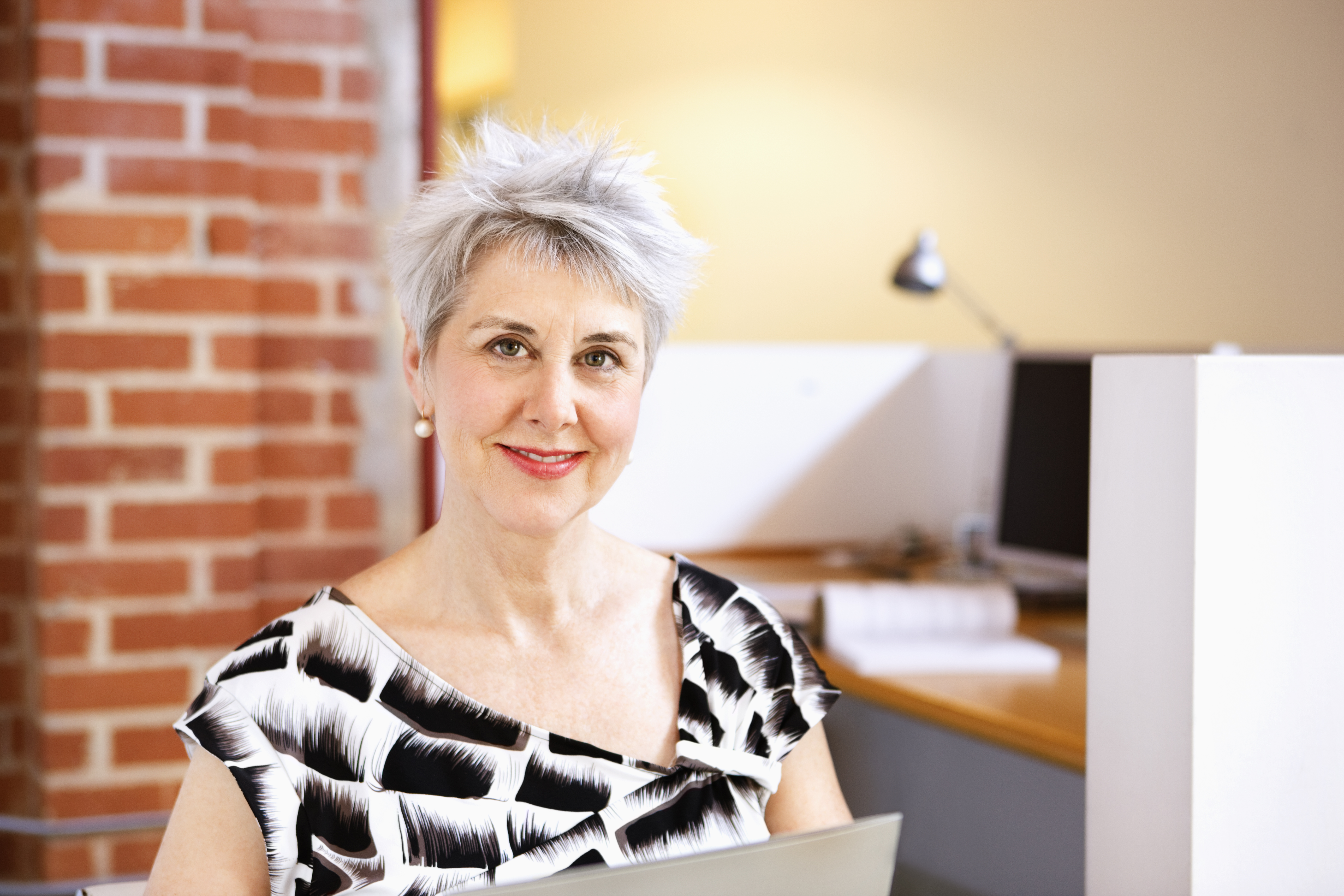 Portrait of smiling, mature business woman