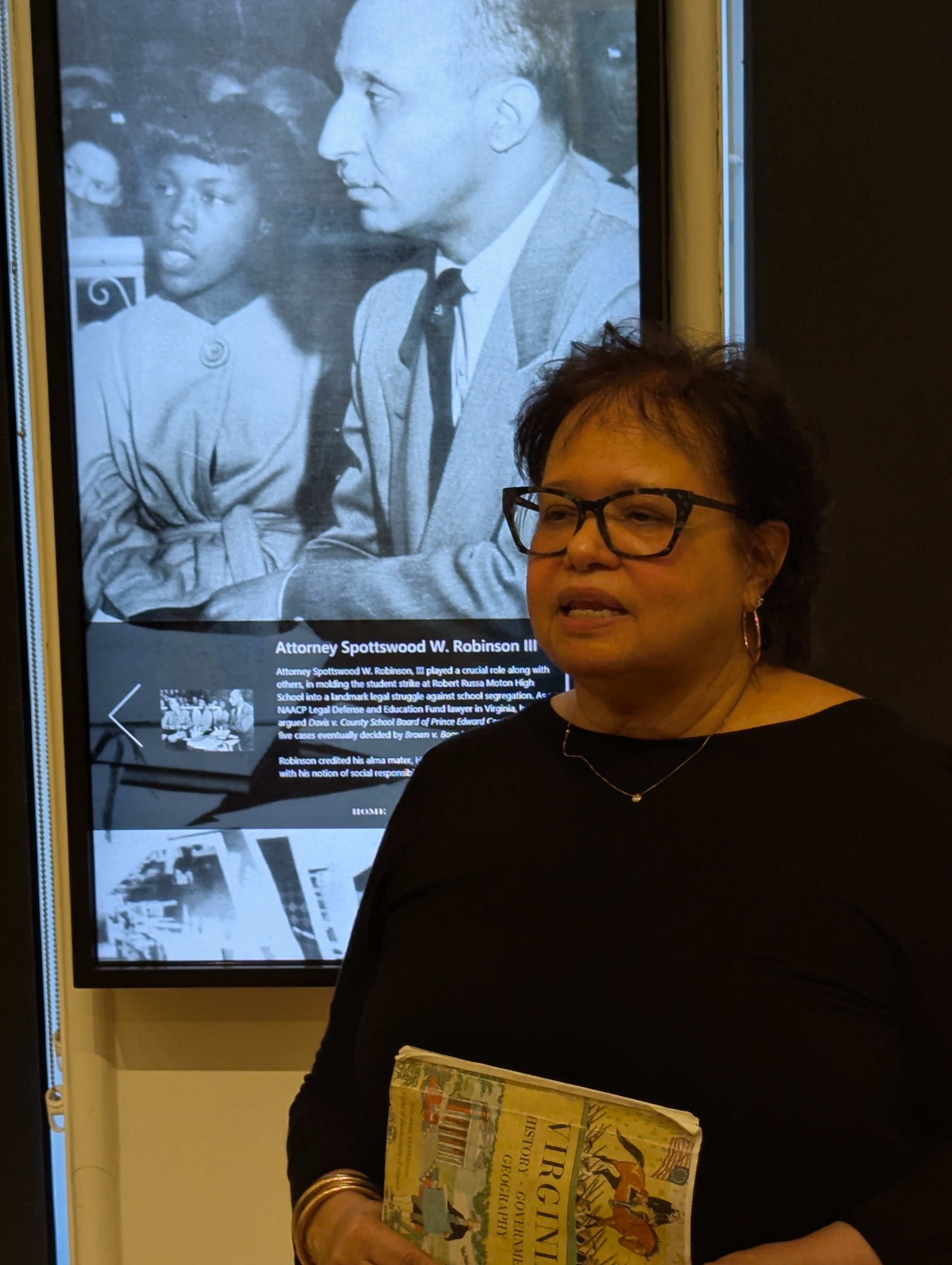 Tour guide Faithe Norrell discussing civil rights lawyer Spottswood Robinson.jpg