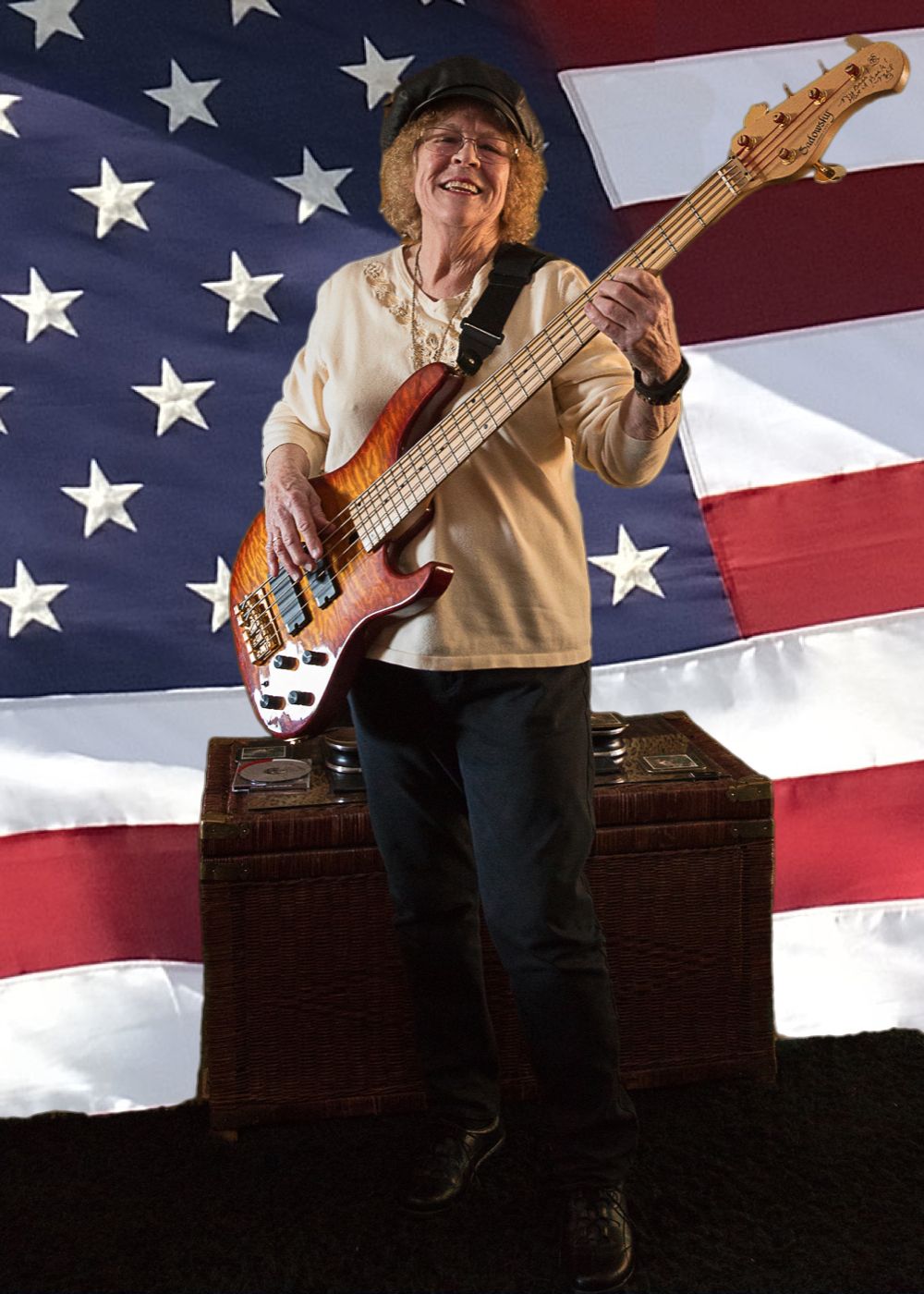 joanne-mead-with-guitar-and-flag