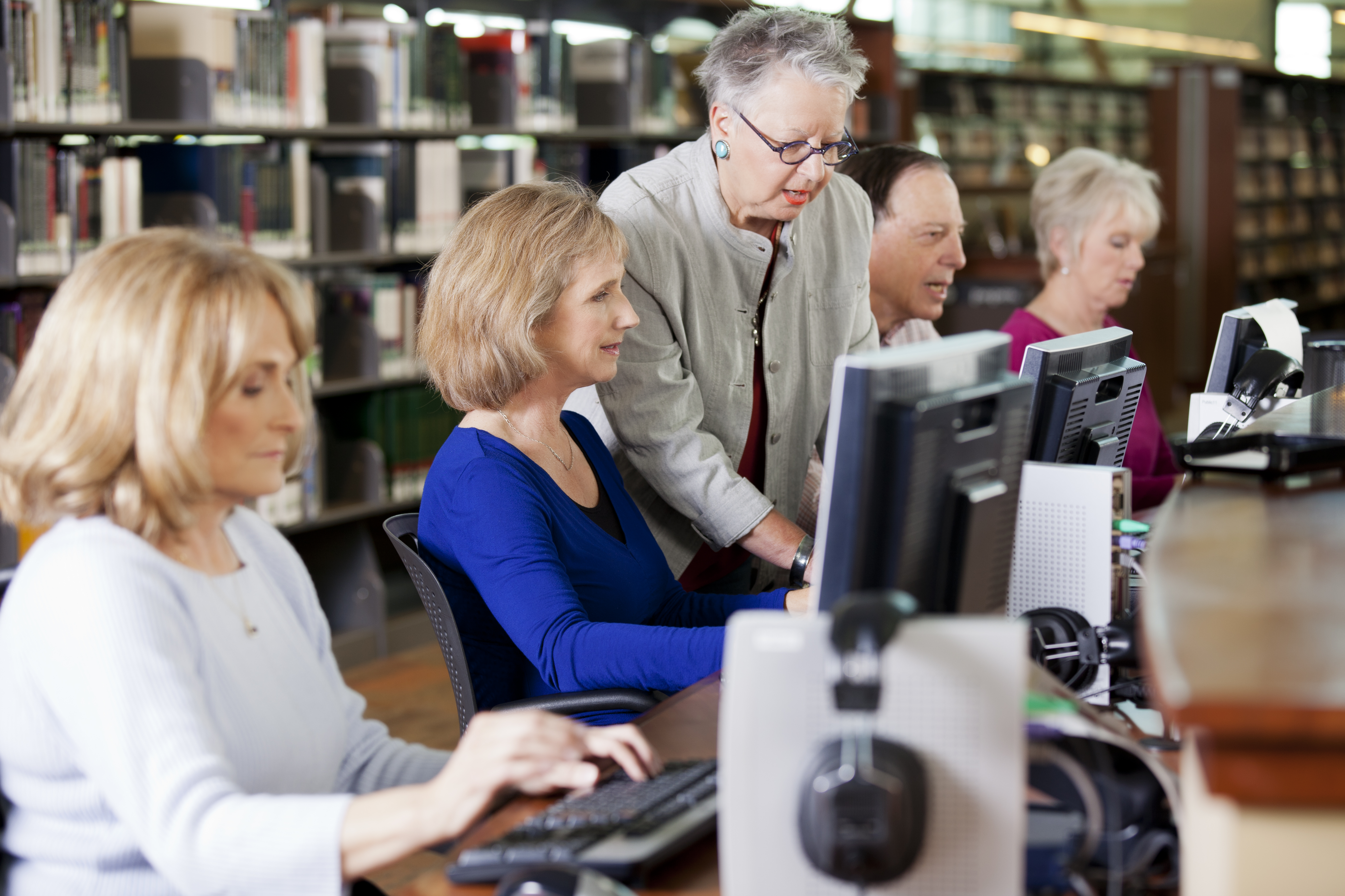 Group of seniors working in a computer lab