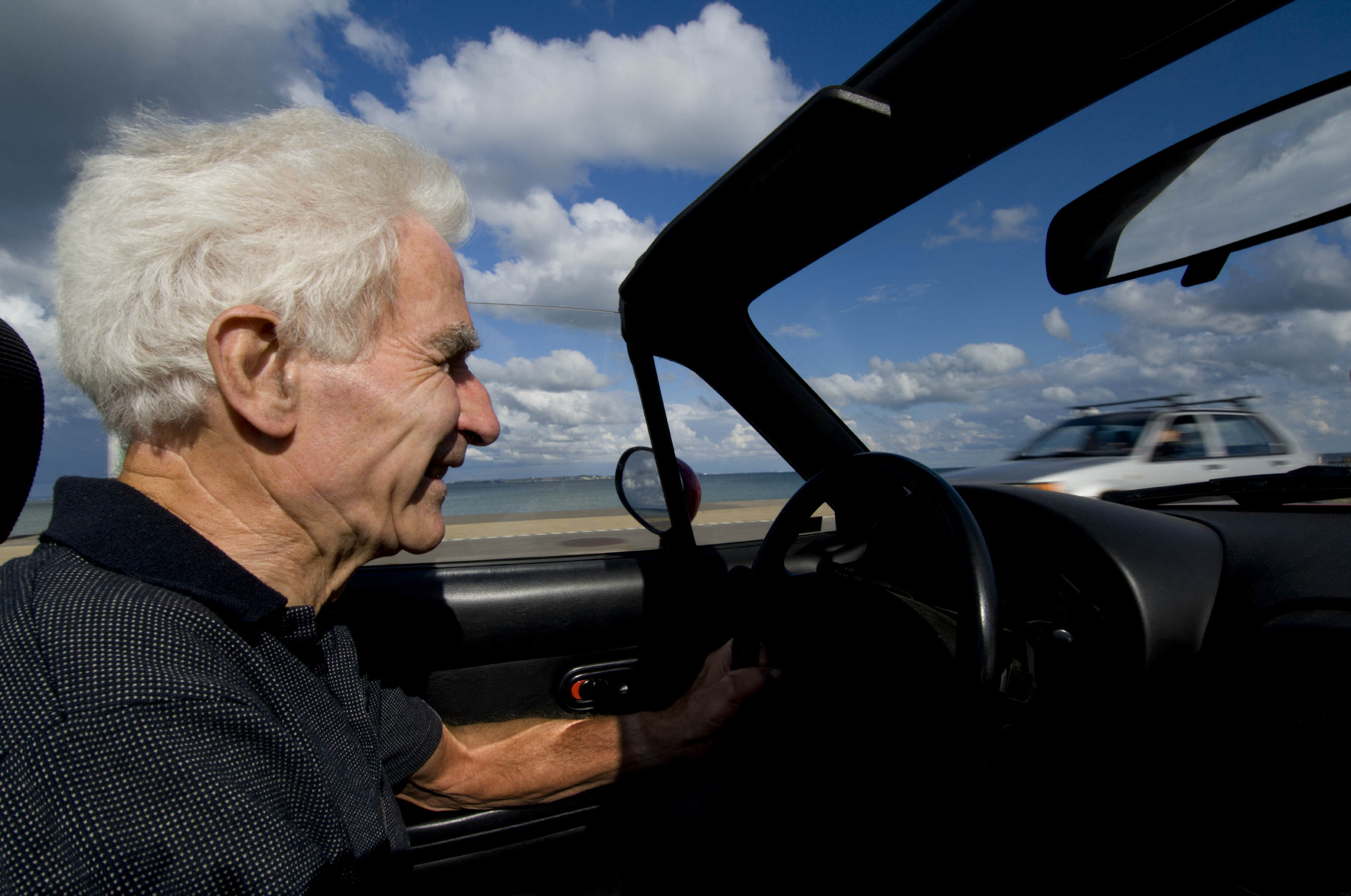 Senior in a convertible