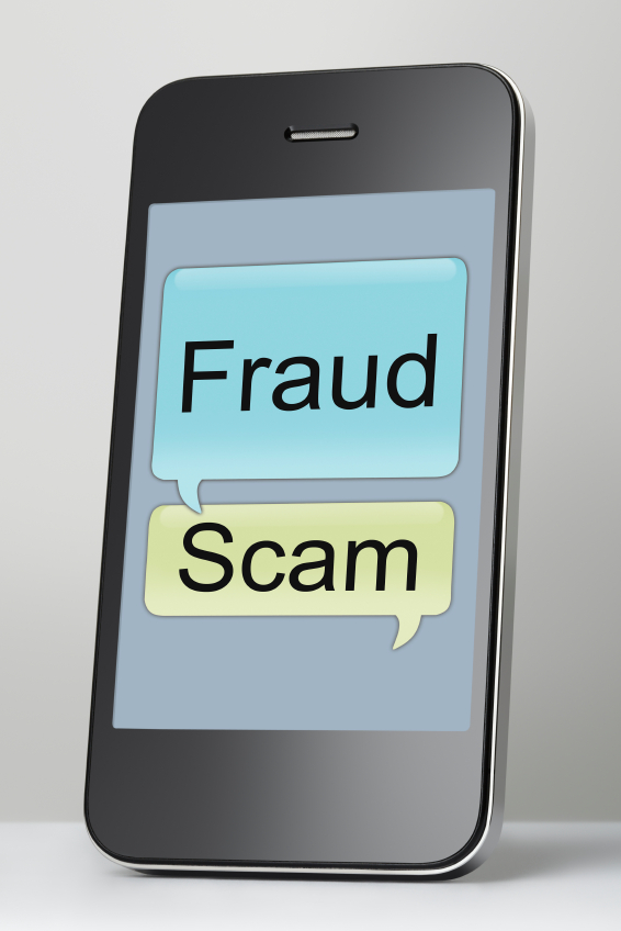Mobile phone with scam and fraud message speech bubble