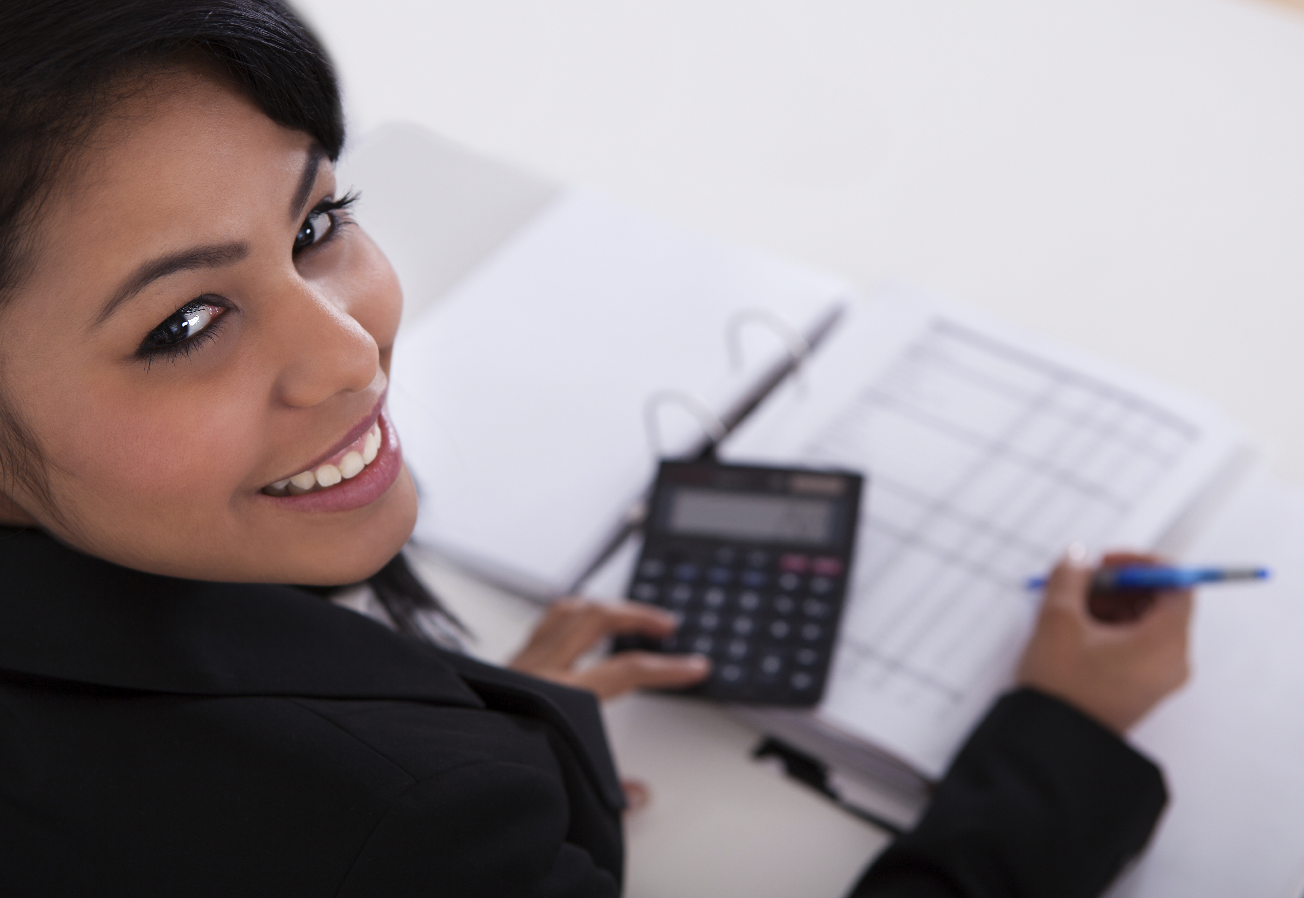 Businesswoman Doing Calculations