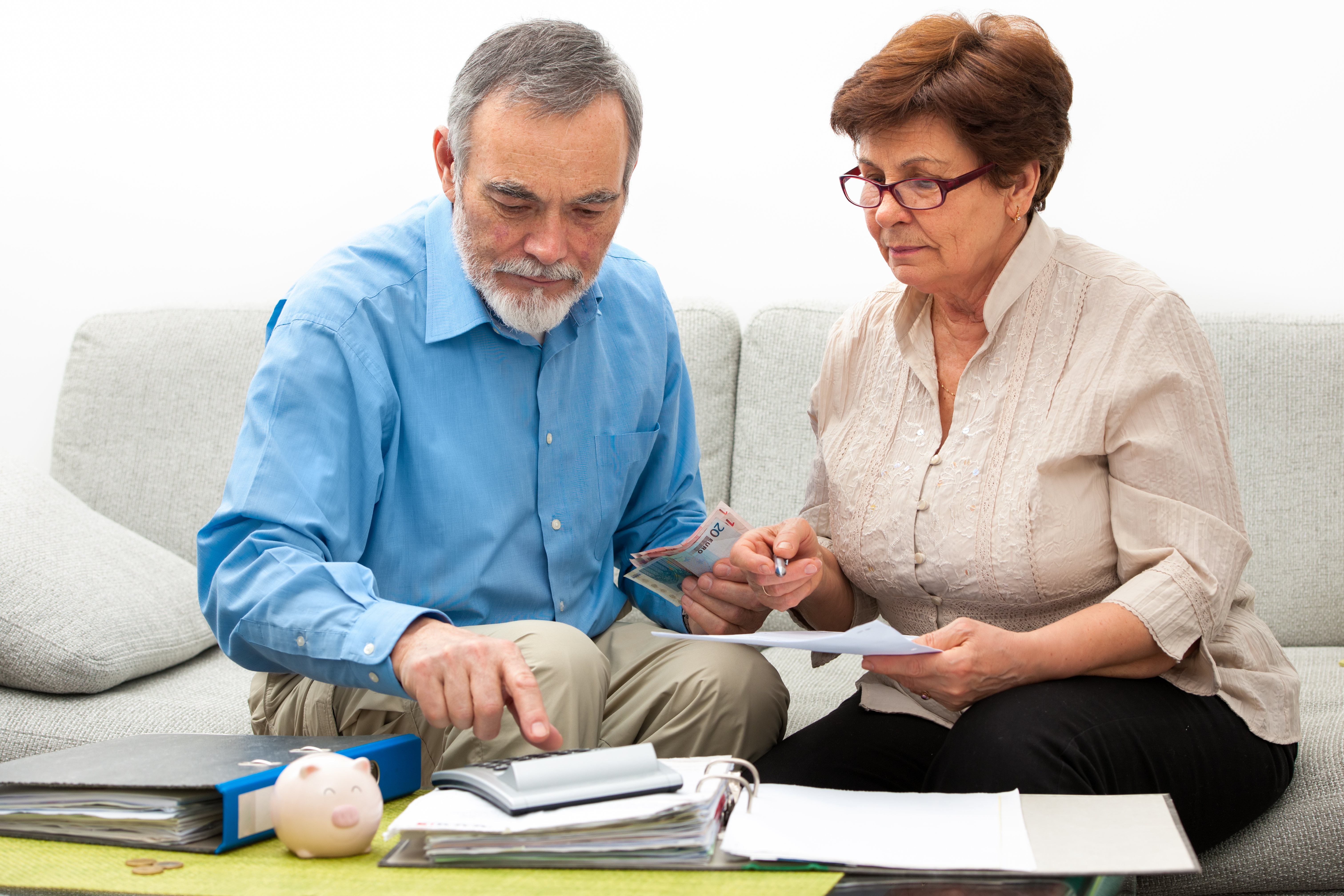 couple calculating home finances