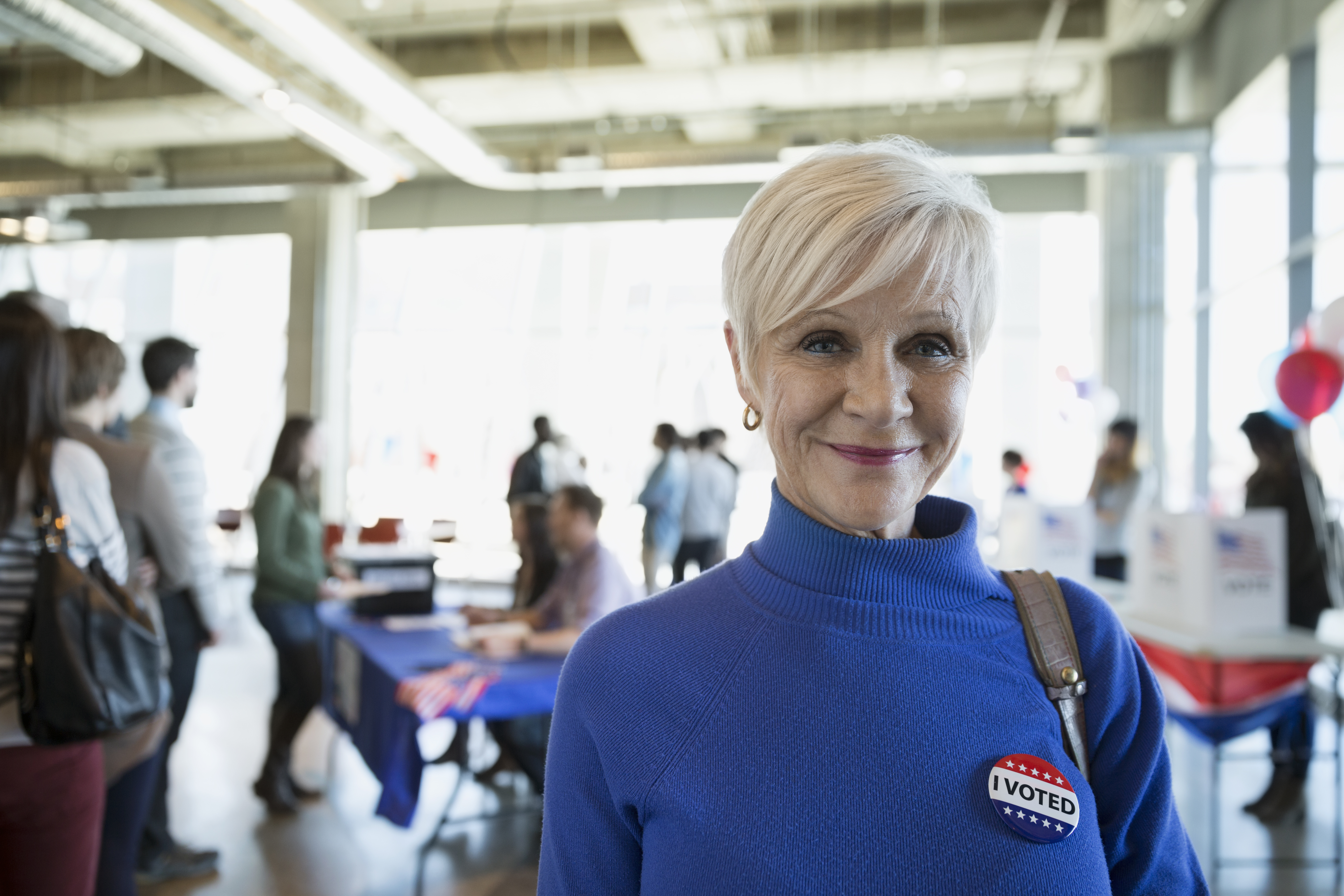 Portrait confident woman at voter polling place