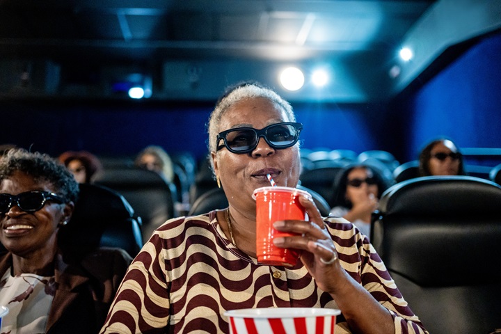 Elderly women with 3d glasses at the cinema