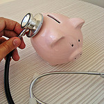 healthcare piggy bank from flickr creative commons credit 401(K) 2013