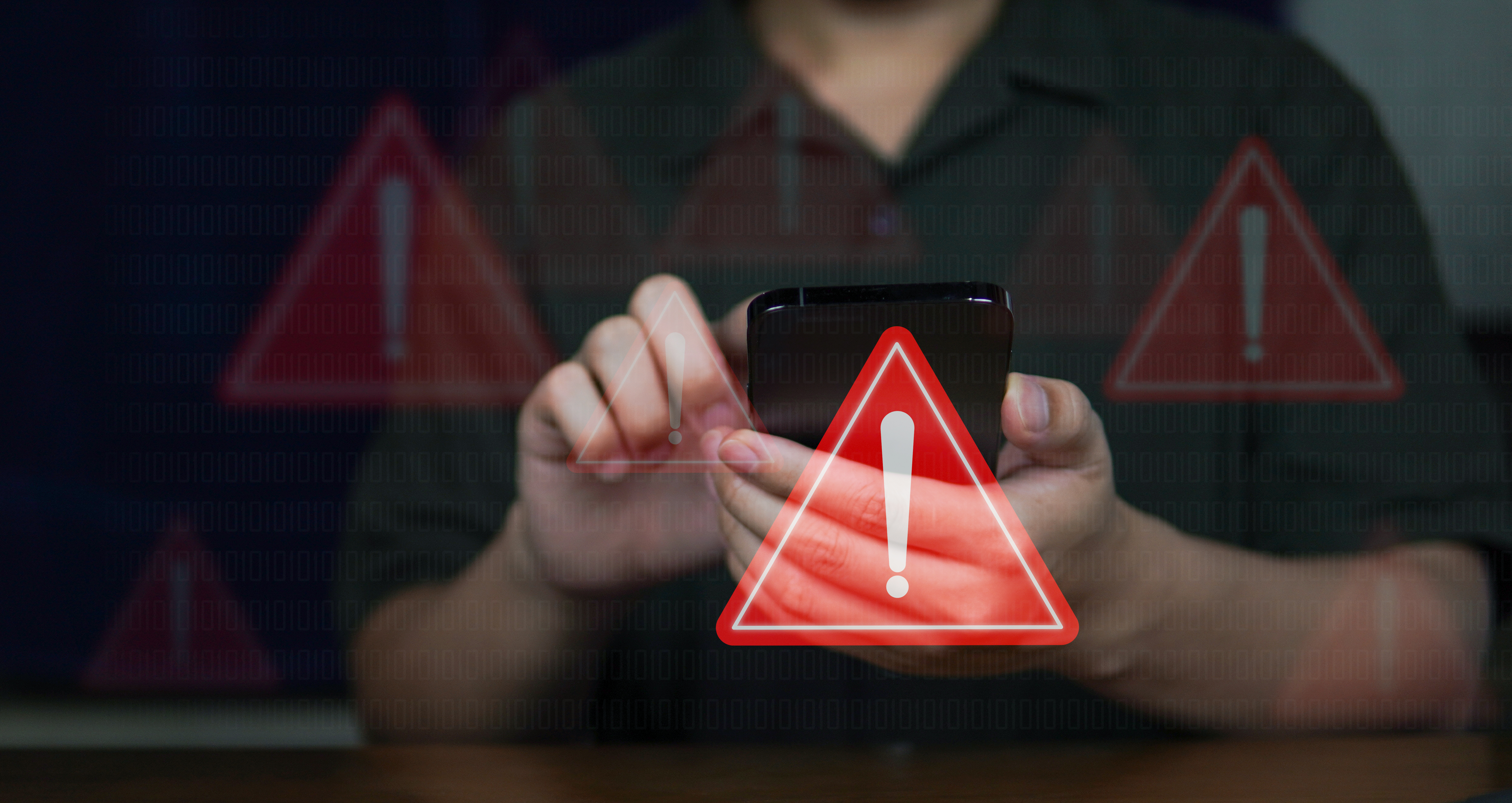 Emergency warning alert alarm on Smartphone, Data network protection, Virus alarm with people using application on smartphone.