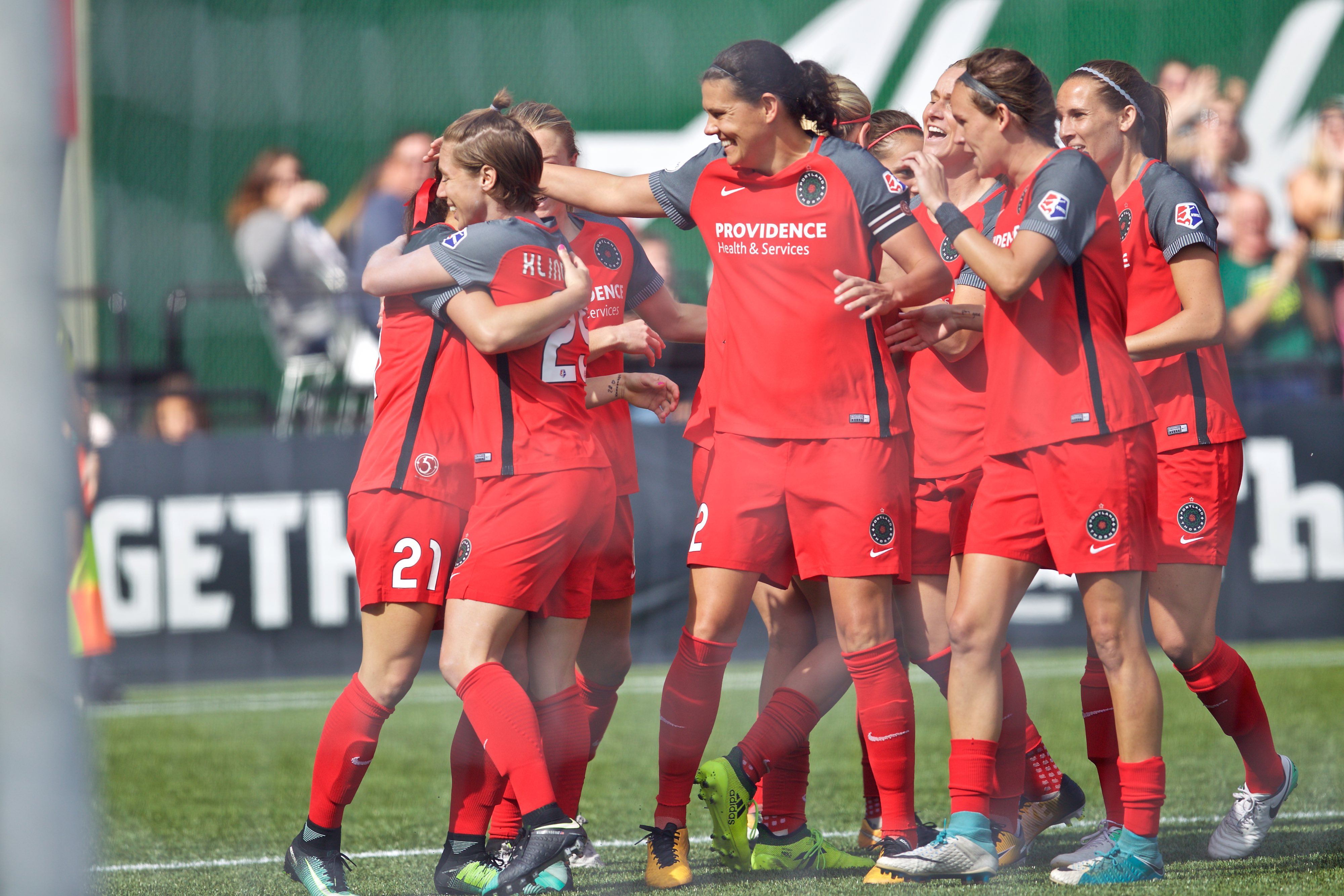 Thorns celebrate after Hayley Raso scored a goal