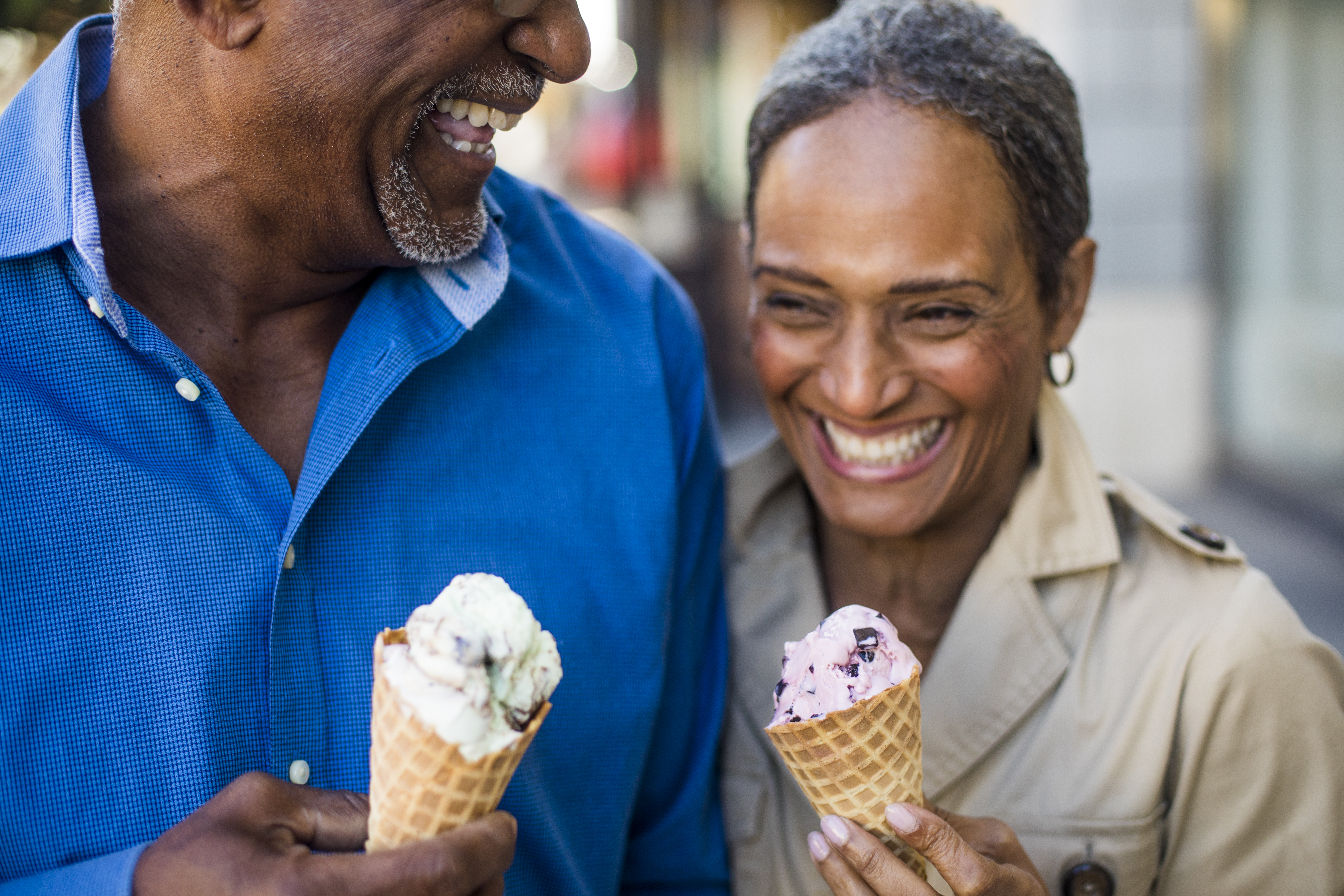 African American Senior Couple On the Town with Ice Cream