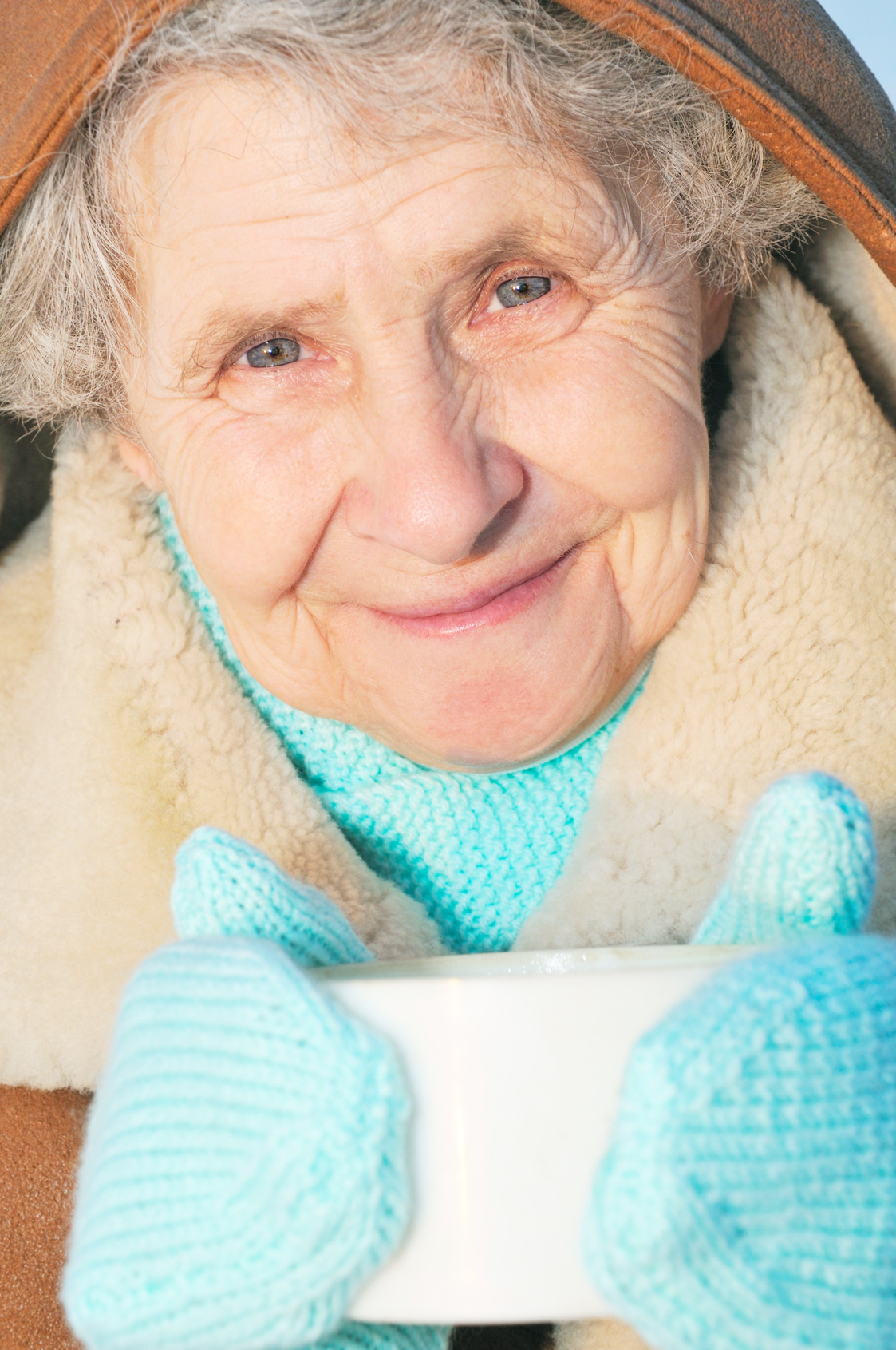 elderly woman with mug