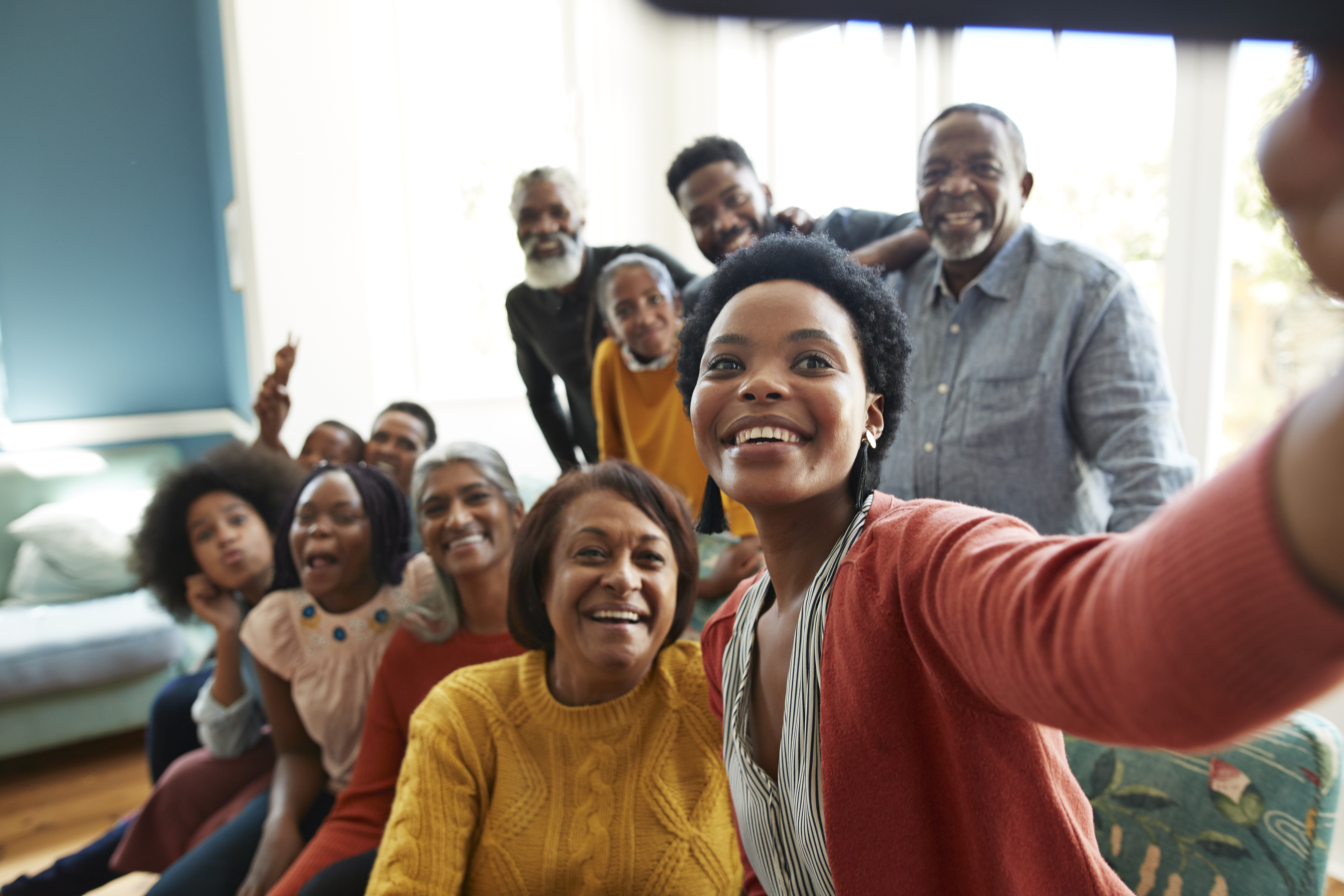 Black family and friends take a selfie