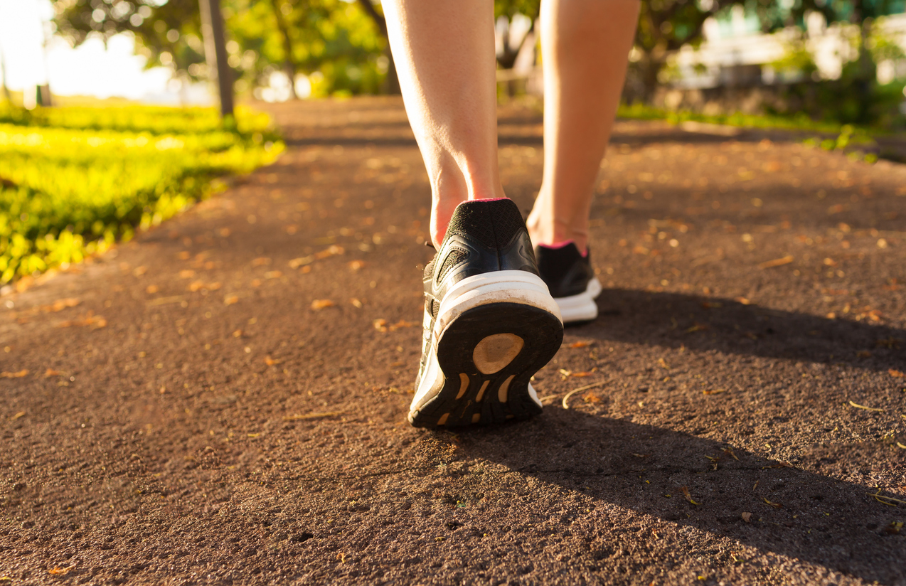 Woman walking on a path