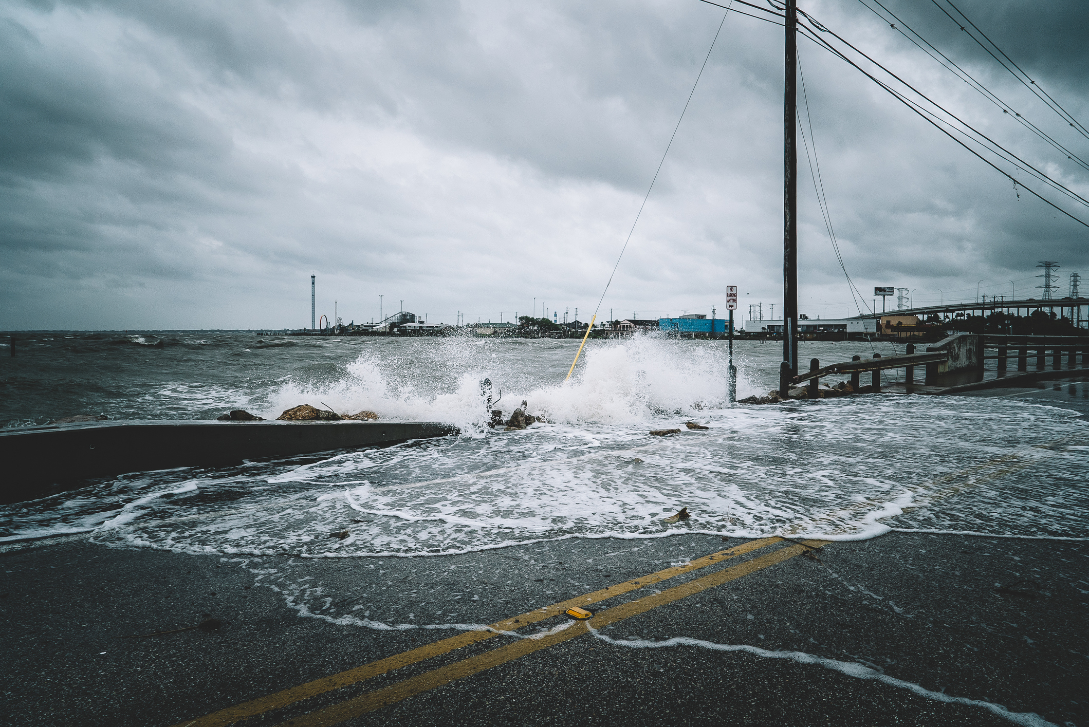 Water crashing over bridge during Hurricane