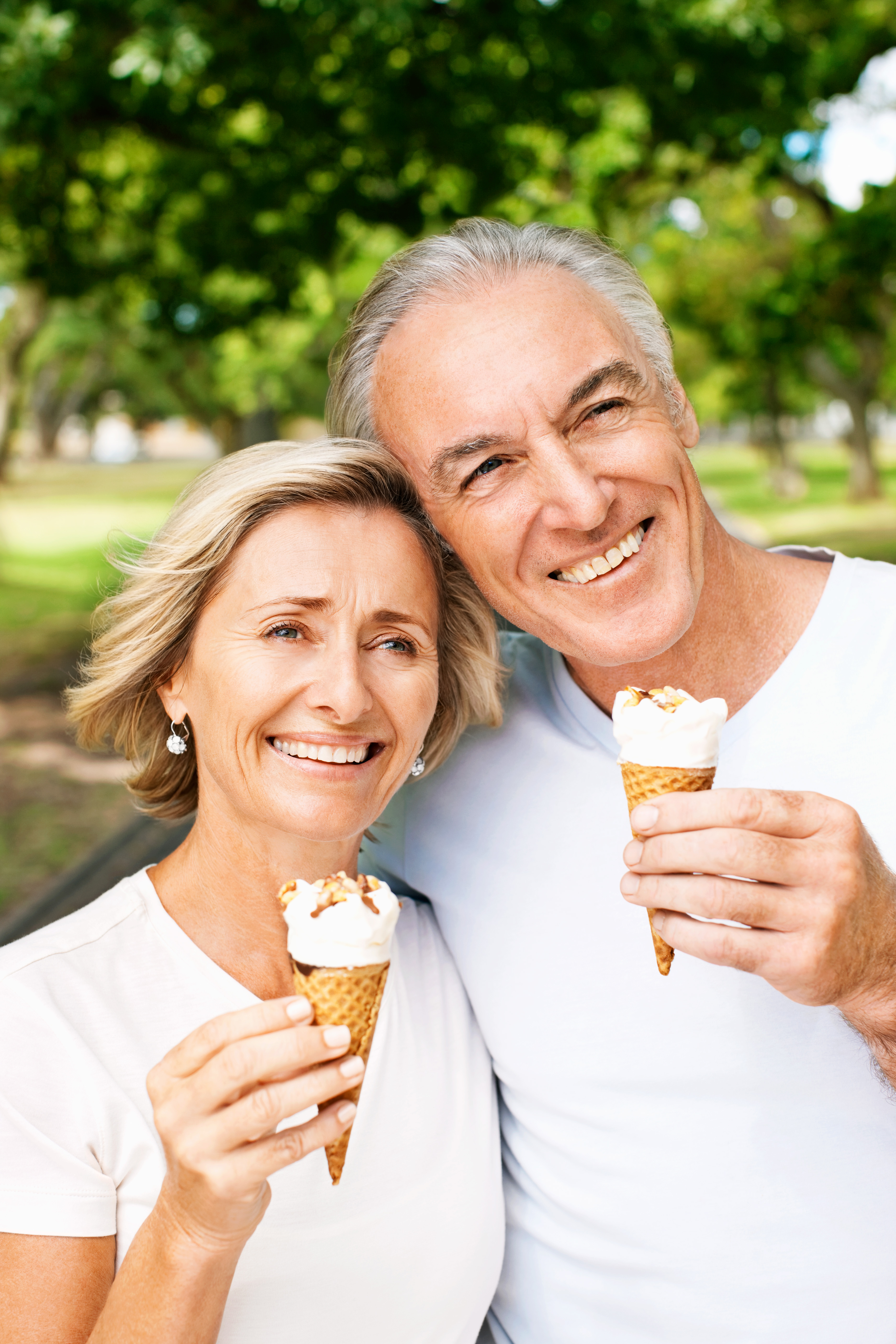 Senior Couple Holding Ice Cream Cones