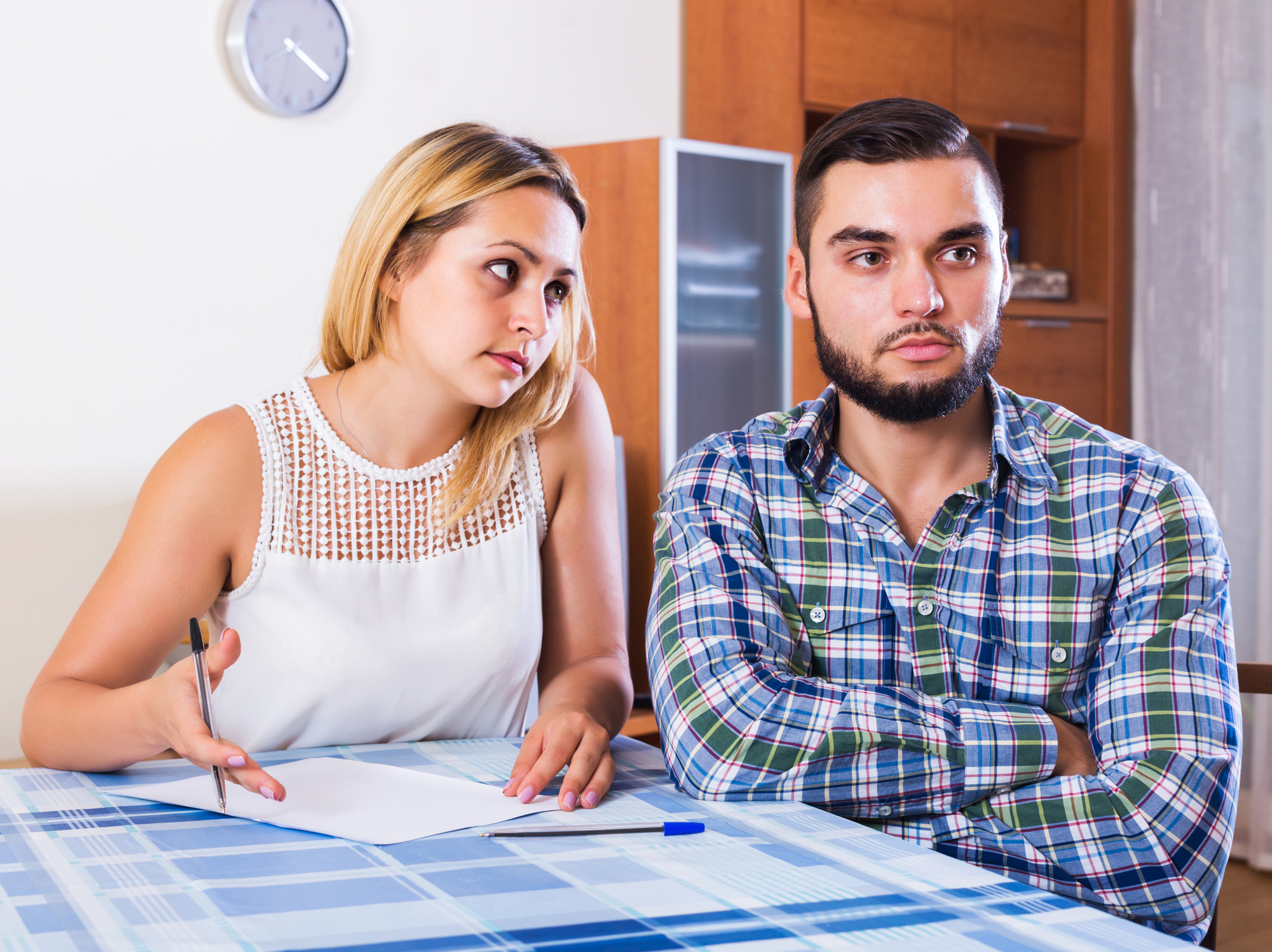 Couple discussing serious financial situation