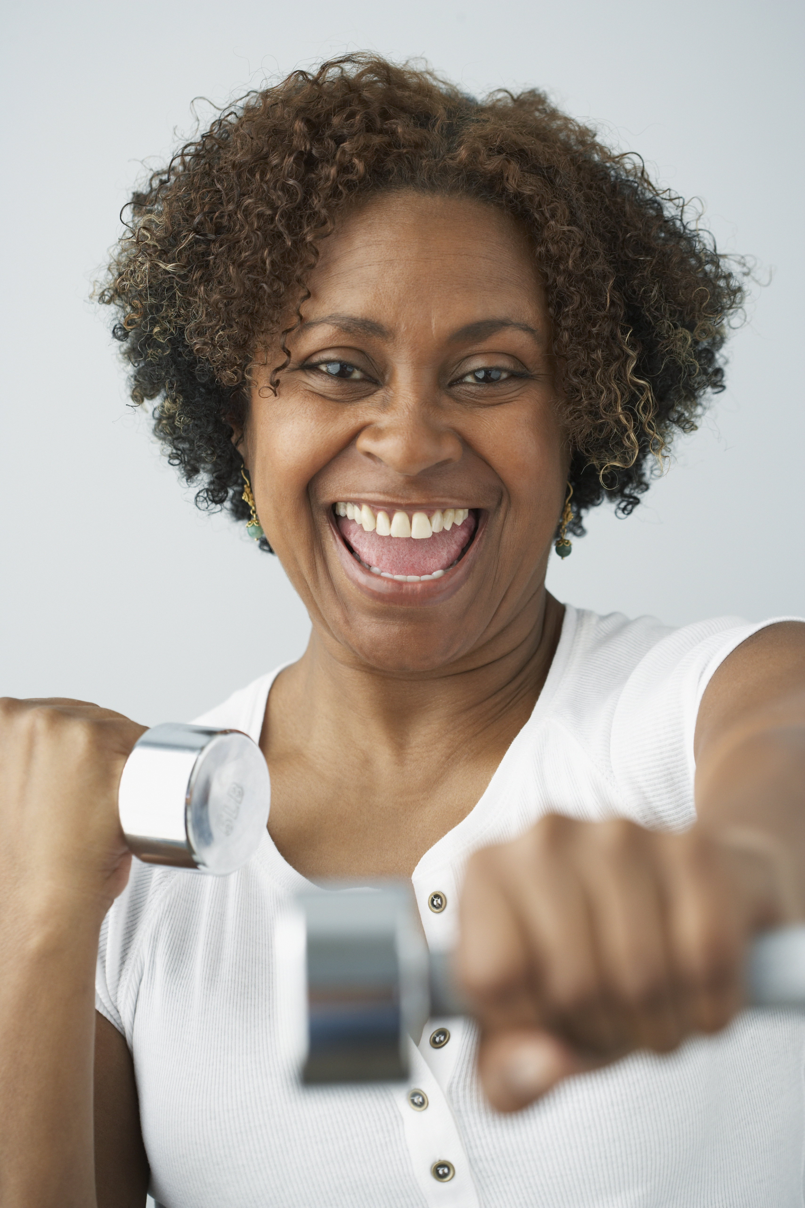 African woman lifting weights