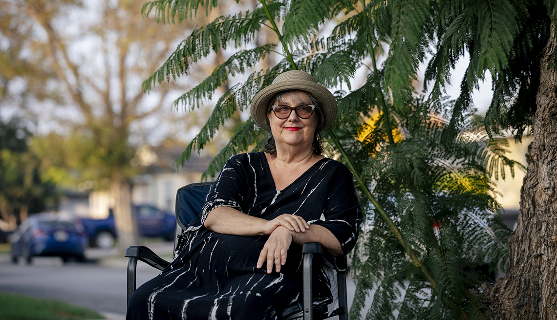 A woman sitting outside