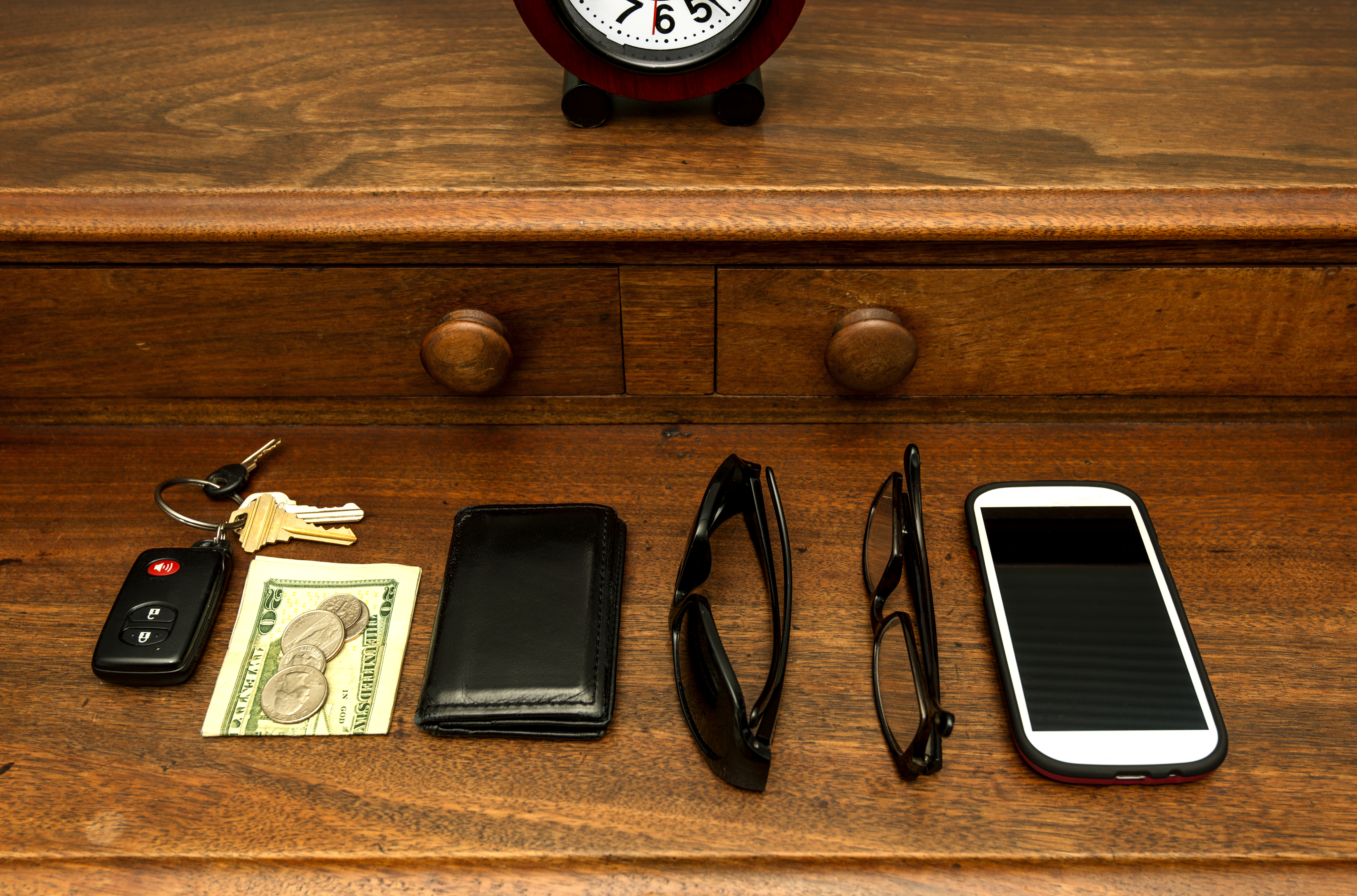 Man's Pocket Items on Dresser