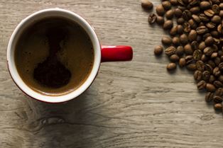 Coffee mug and beans