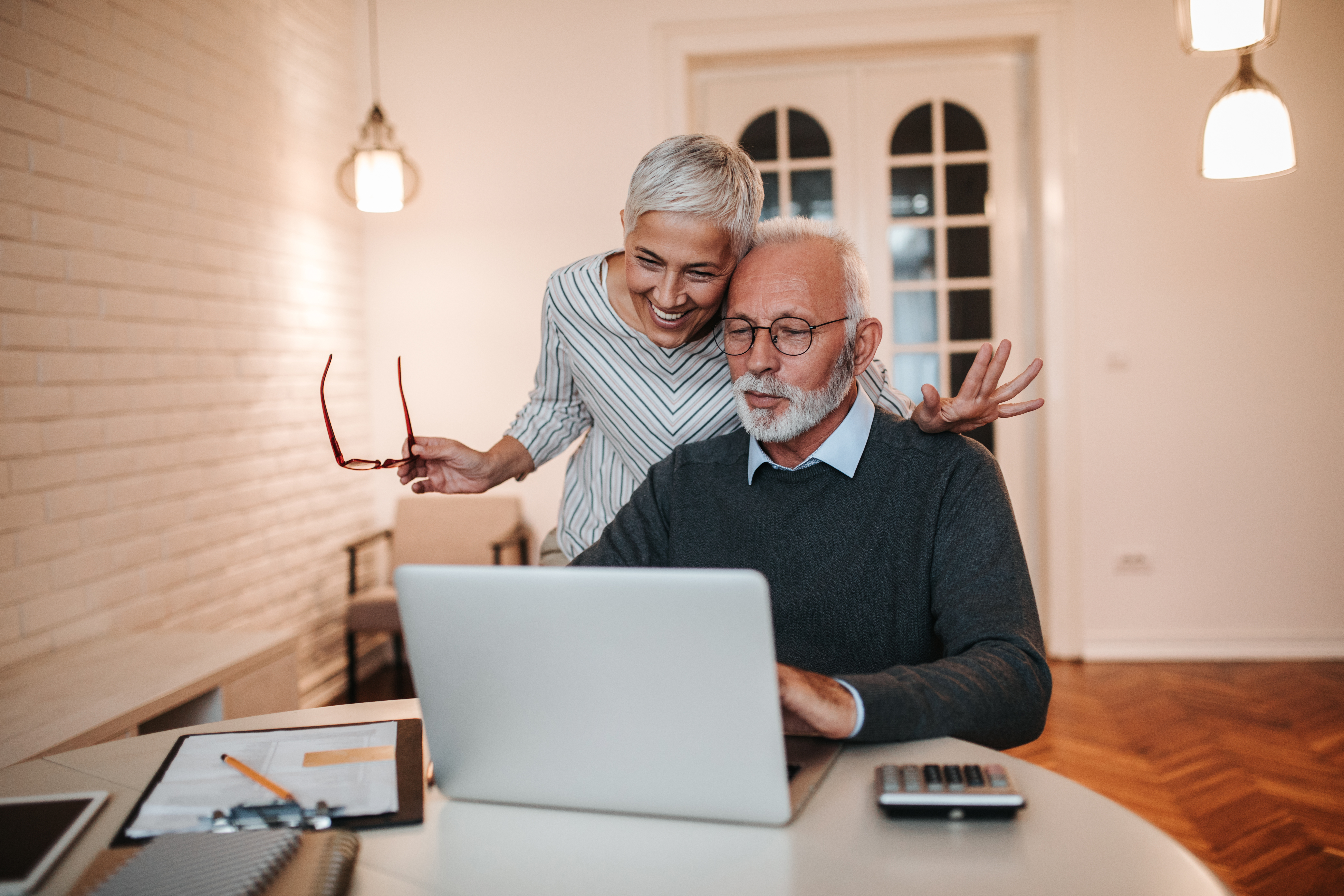 An older couple at a computer