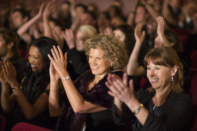 Clapping theater audience