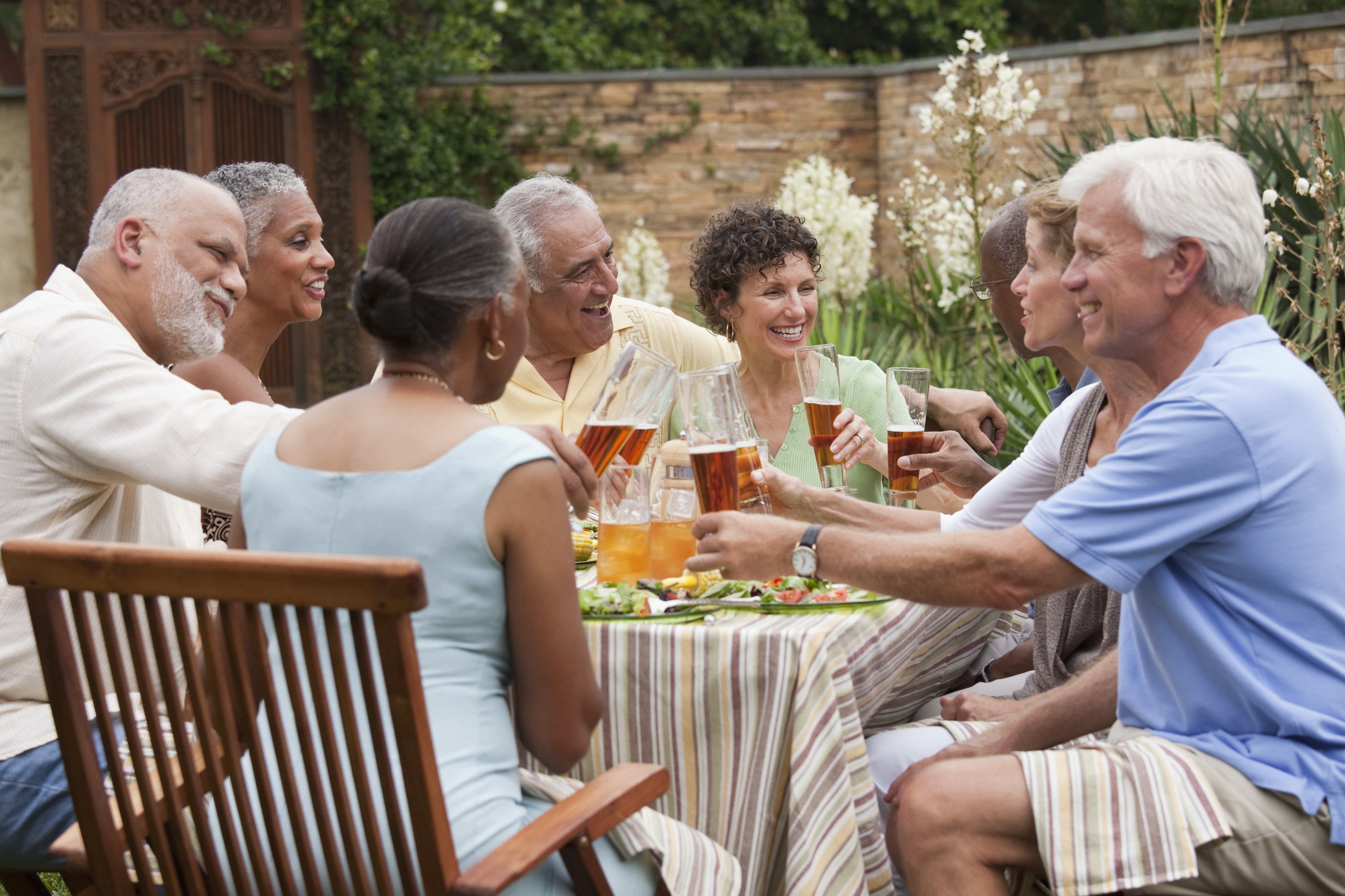 Friends having dinner party on patio