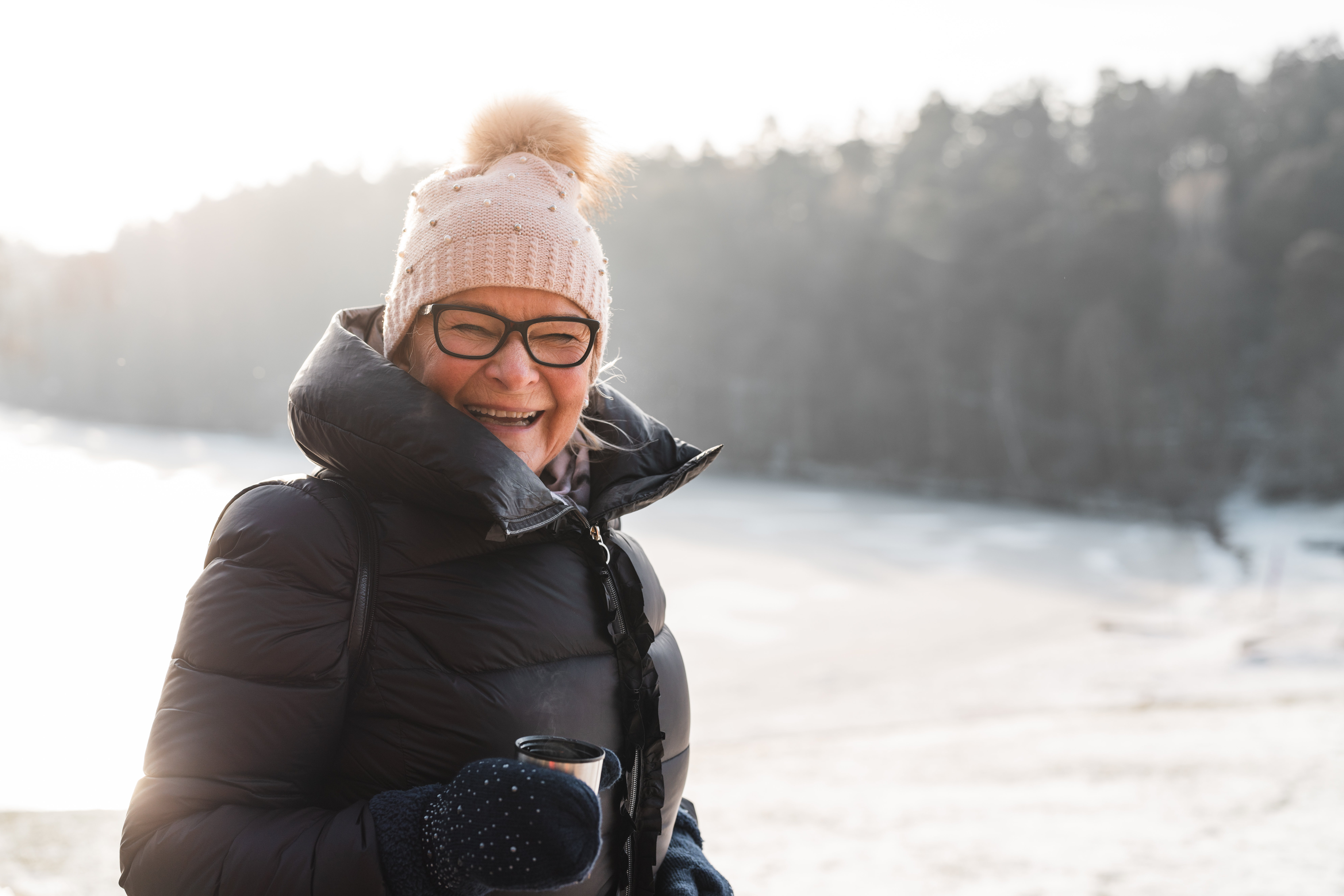 Active seniors exploring the Swedish winter landscapes